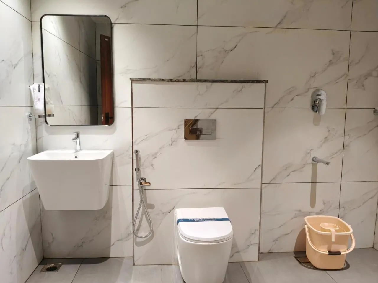 Toilet in Mayo Suites