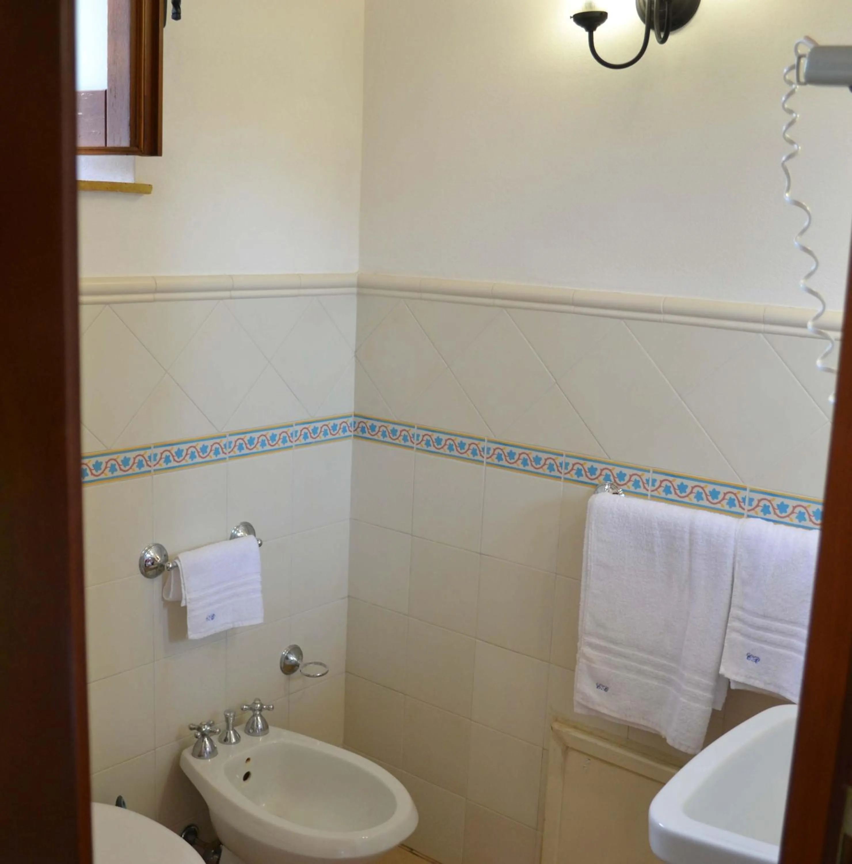 Toilet in HOTEL Cala Buguto