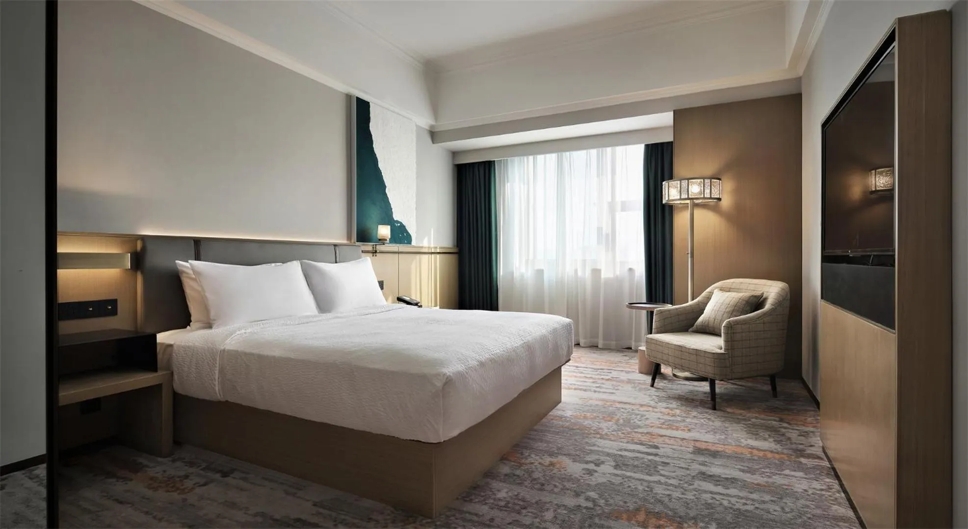 Bed in Wanda Yi Hotel Wuxi