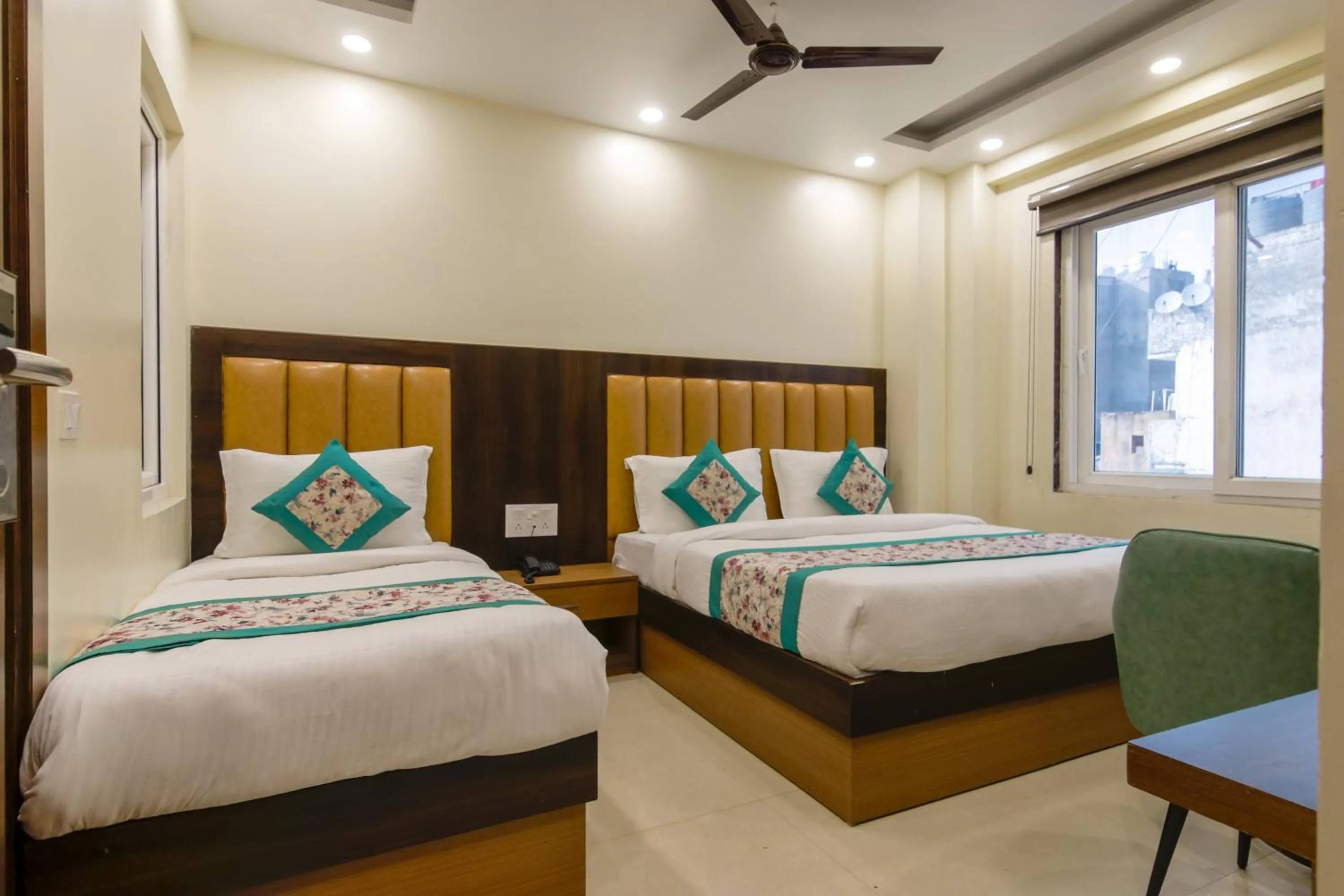 Photo of the whole room, Bed in Hotel Royal Rosette Near New Delhi Railway Station - Connaught Place and VFS