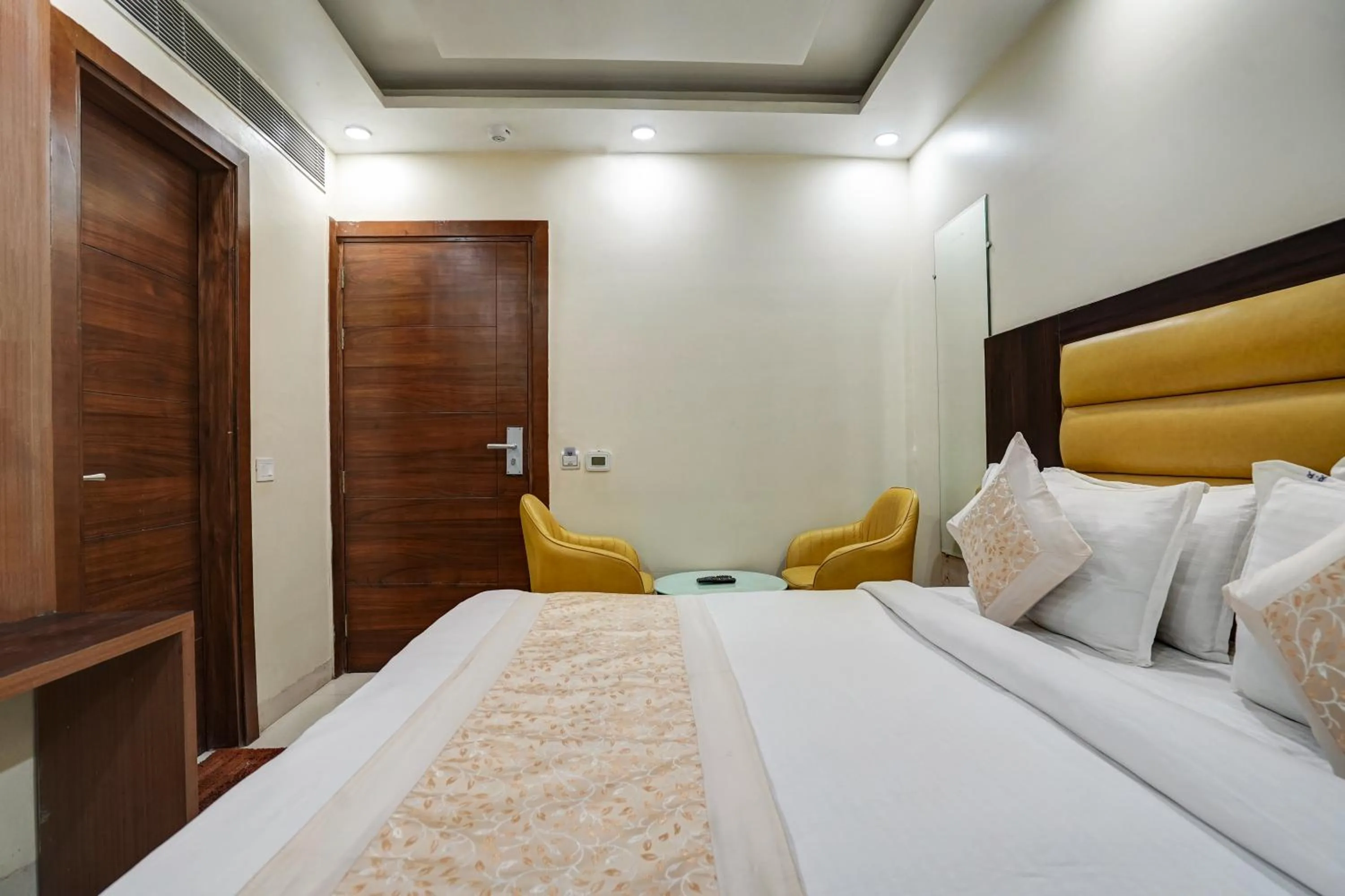 Photo of the whole room, Bed in Hotel Royal Rosette Near New Delhi Railway Station - Connaught Place and VFS