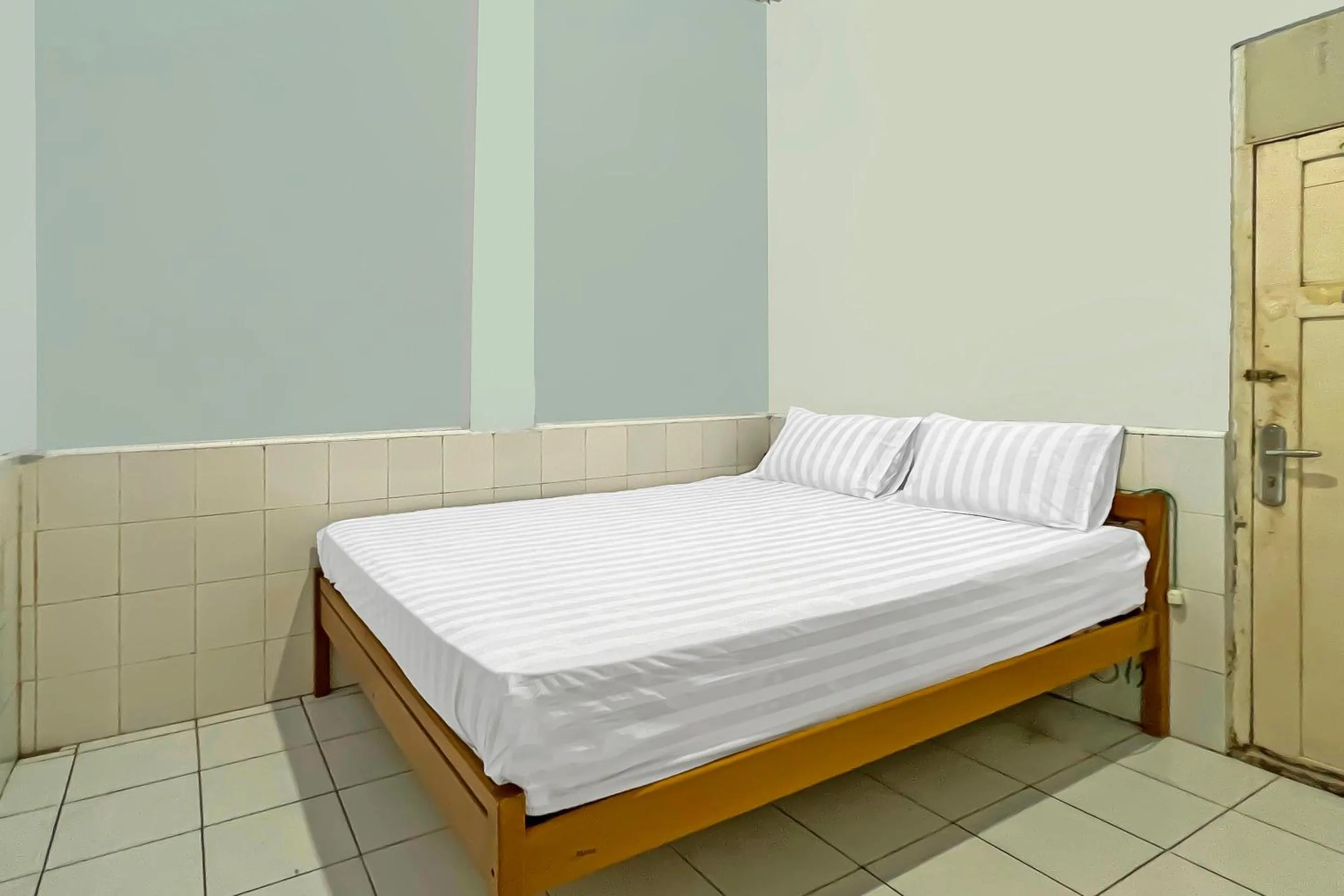 Bedroom, Bed in Hotel O Oma Homestay