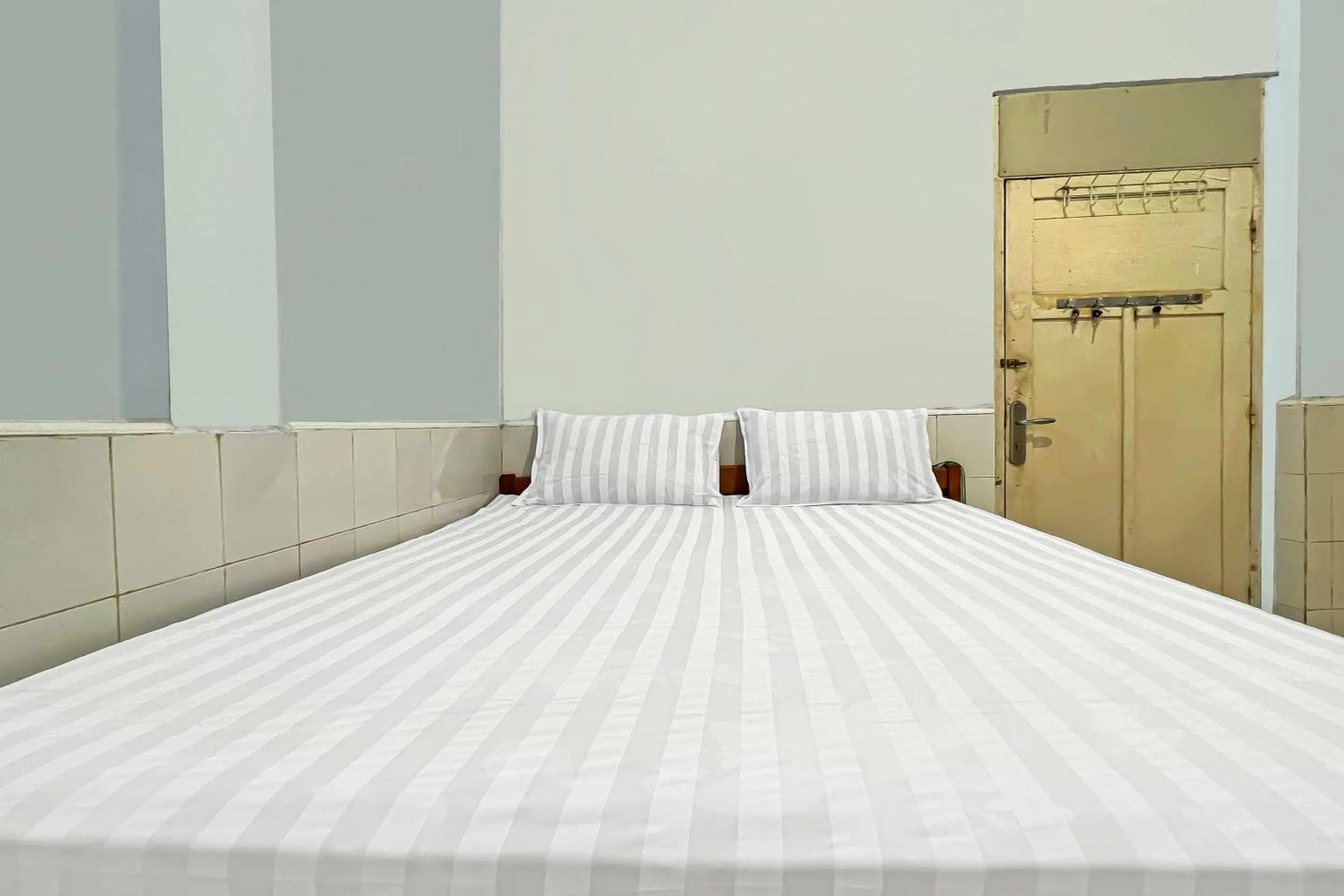 Bedroom, Bed in Hotel O Oma Homestay