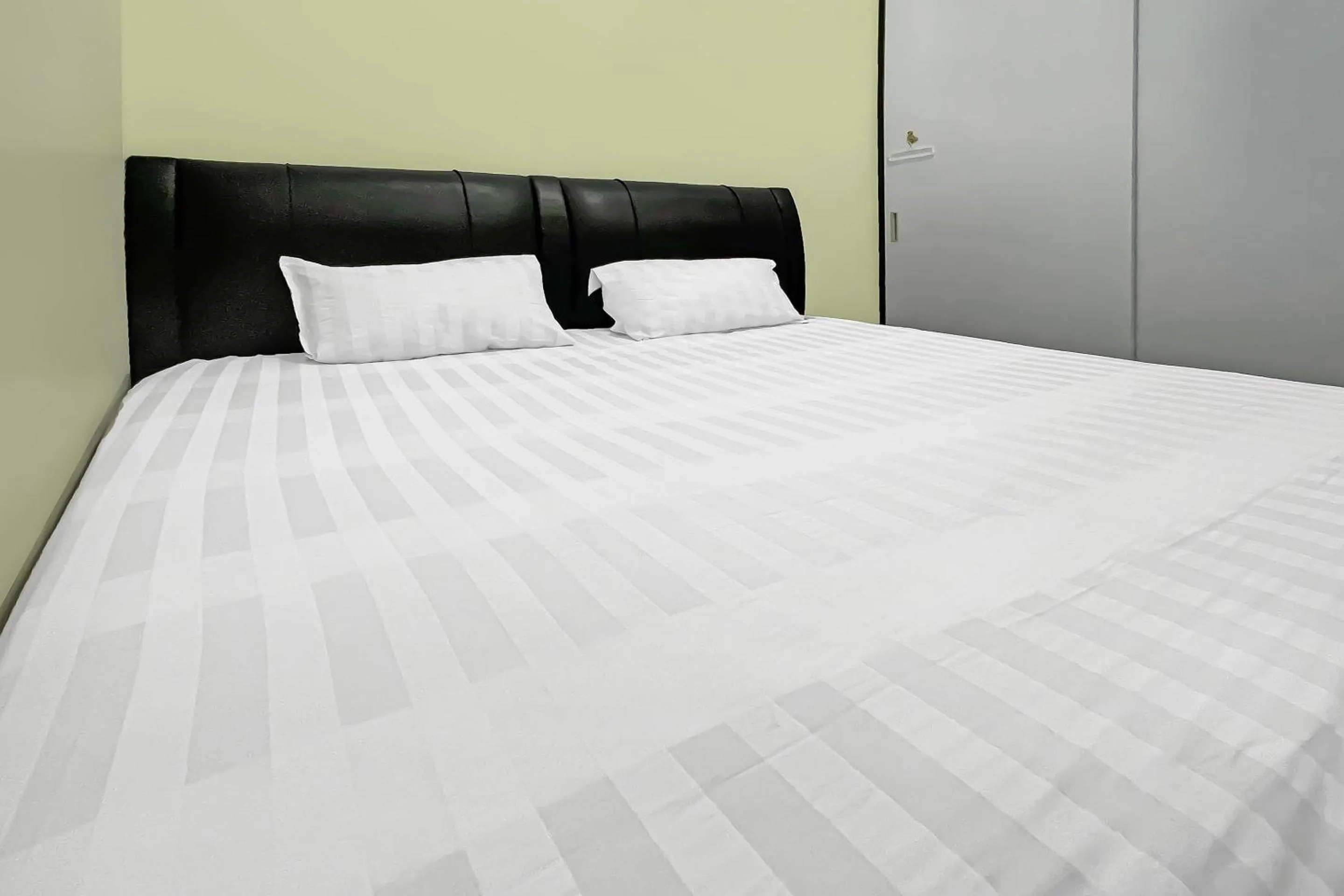 Bedroom, Bed in Hotel O Oma Homestay