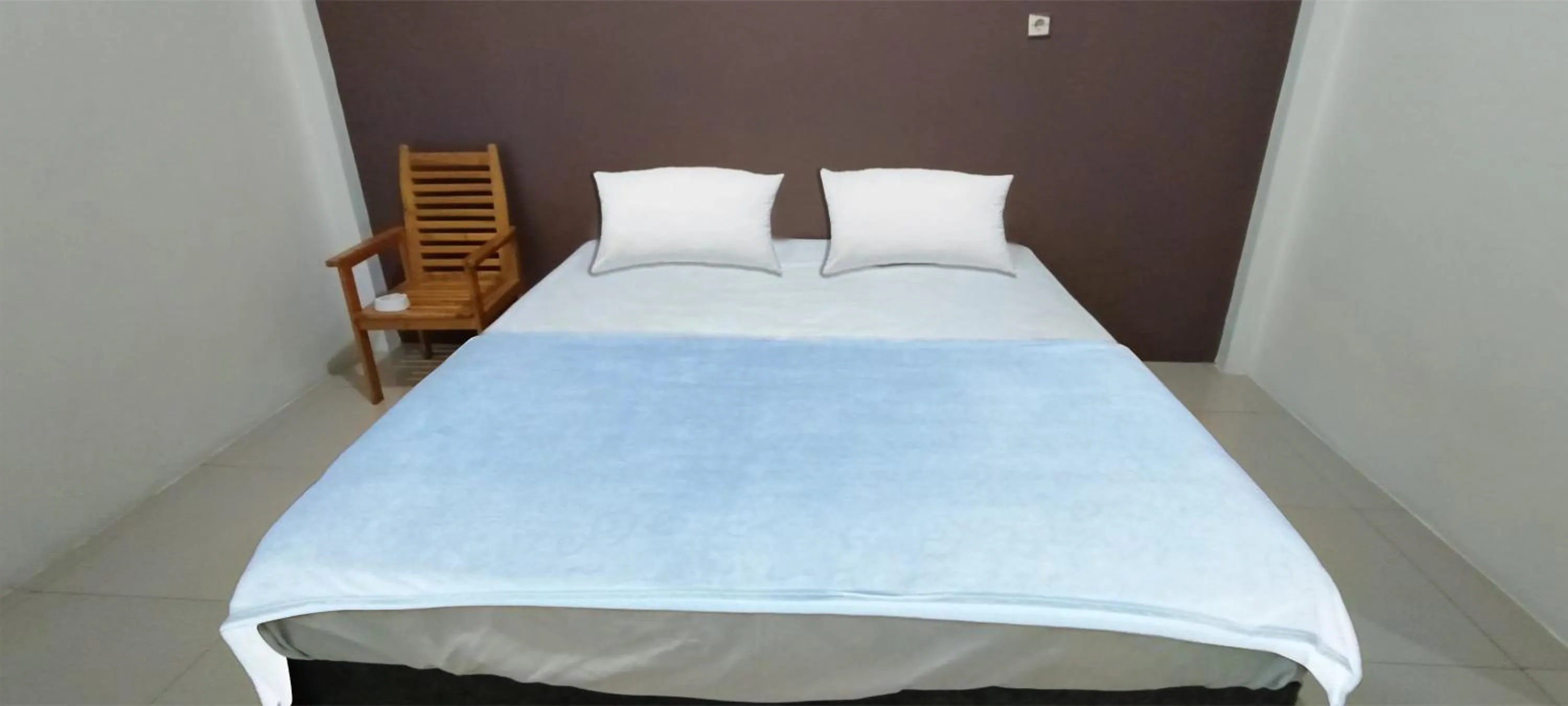 Bedroom, Bed in Hotel O Wisma Deli Syariah Near RSUD Nene Mallomo Sidenreng Rappang