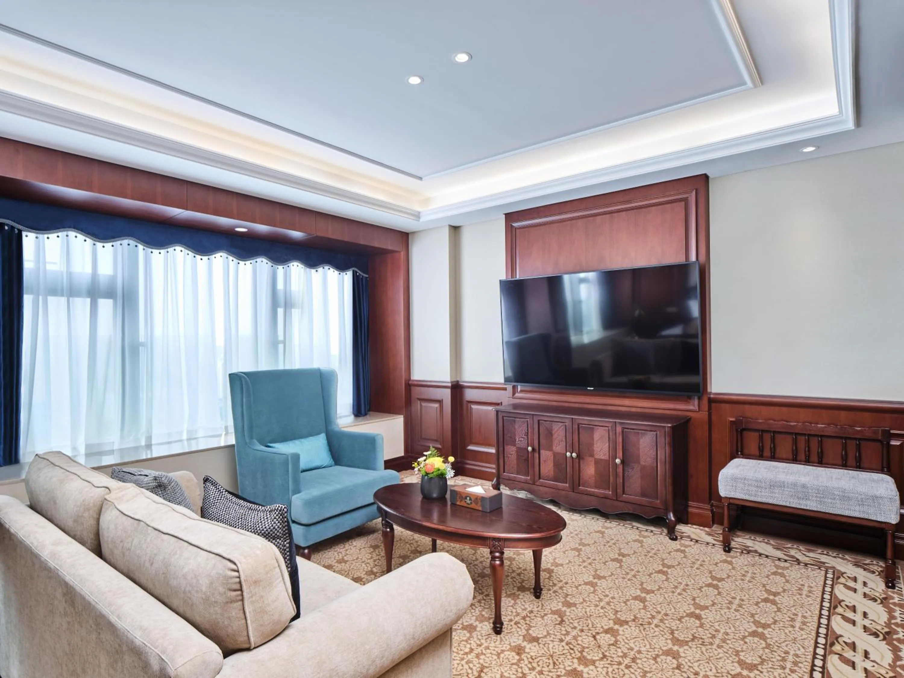 Communal lounge/ TV room in Guangming CIMC Executive Hotel Shenzhen