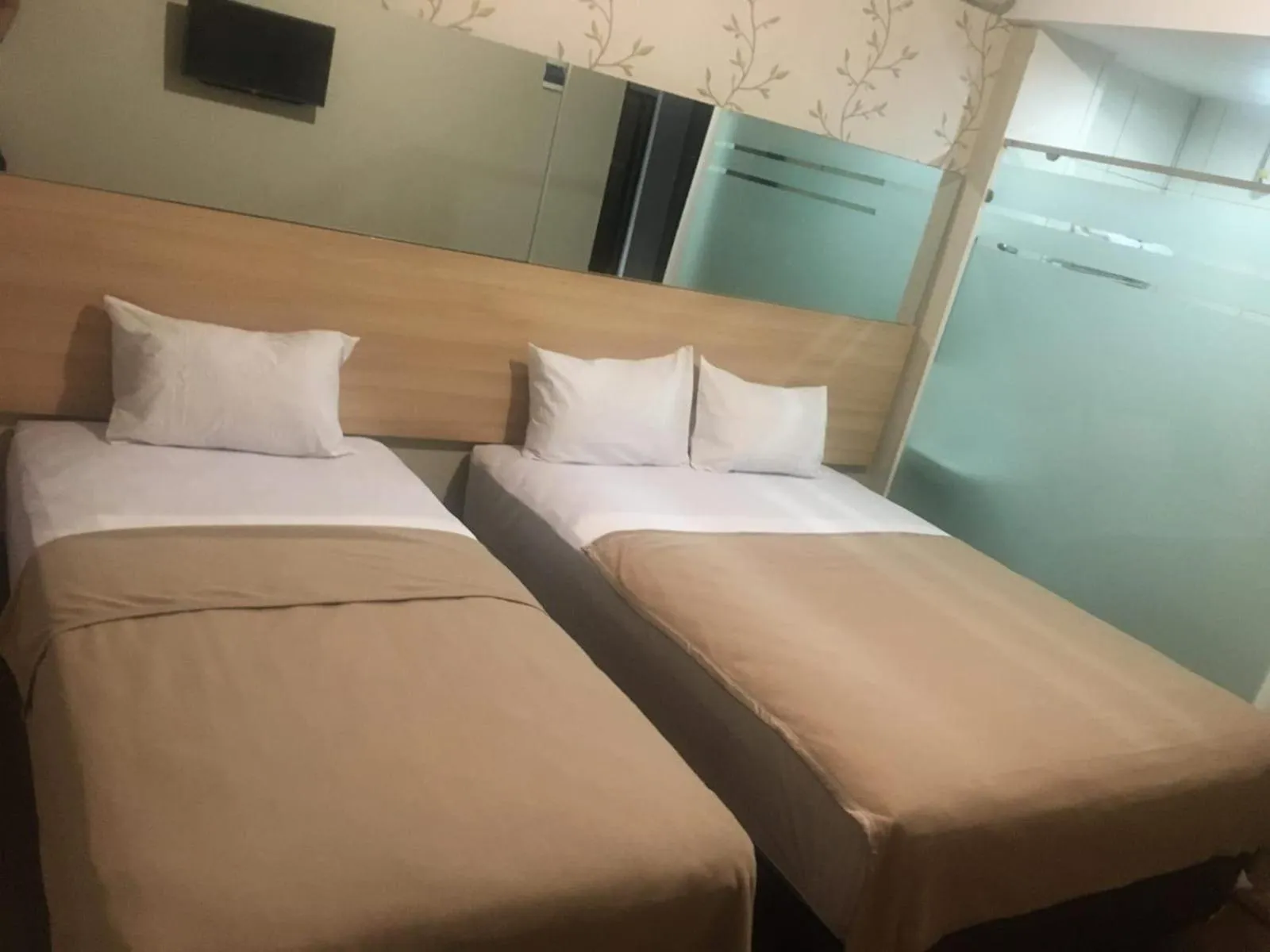 Bed in Royal Guesthouse Bandar Lampung