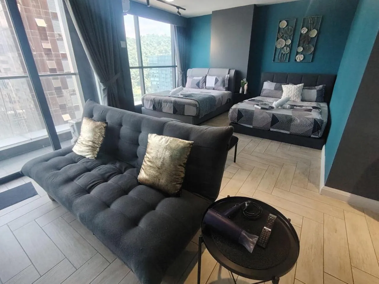 Bed in Empire City PJ Studio Suites by Manhattan Group