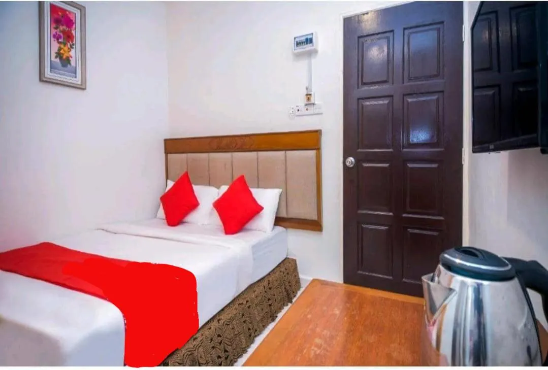 Bed in Hotel Jerai Ct Inn