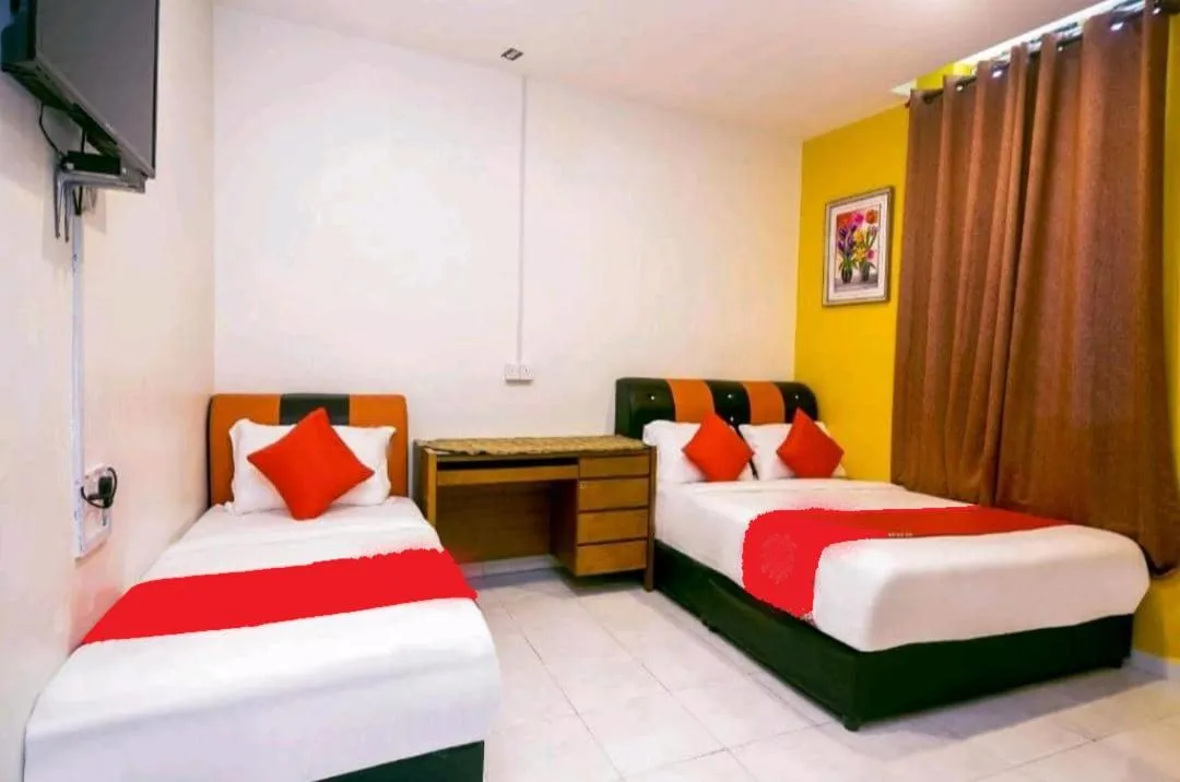 Bed in Hotel Jerai Ct Inn