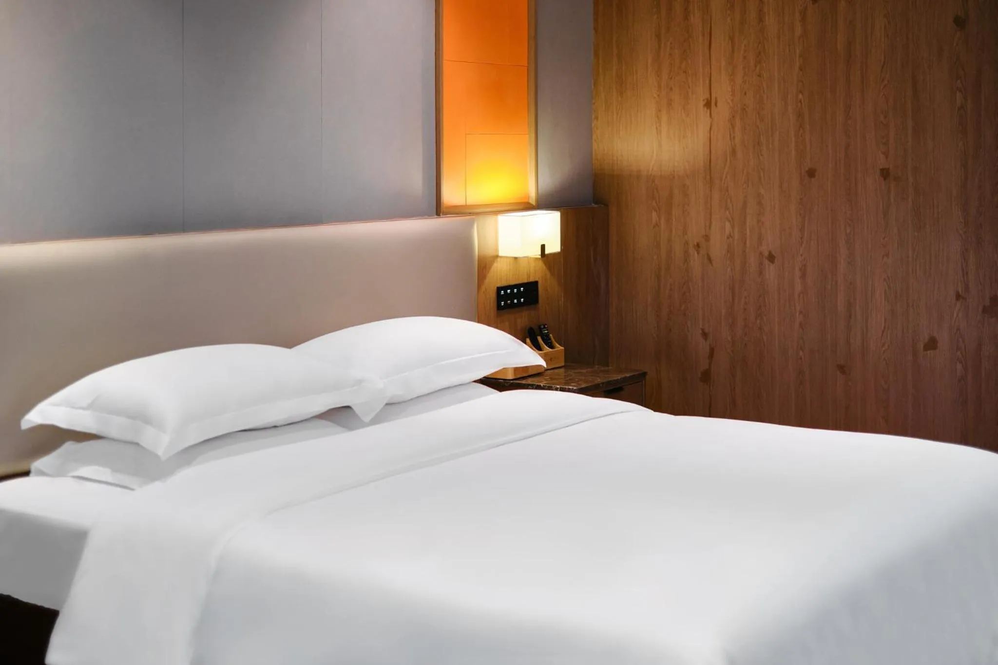 Bed in Harriway Garden Hotel Houjie