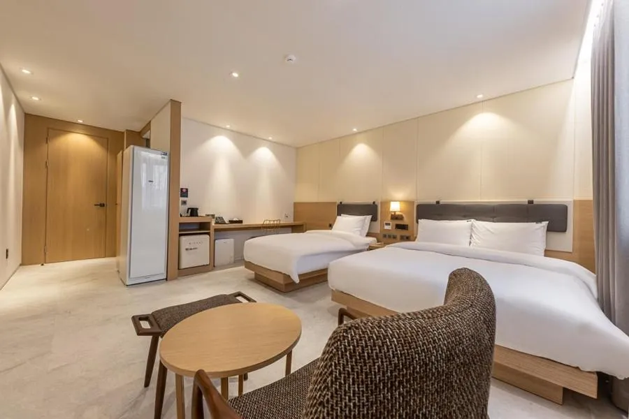 Bed in Masan Daisy Hotel