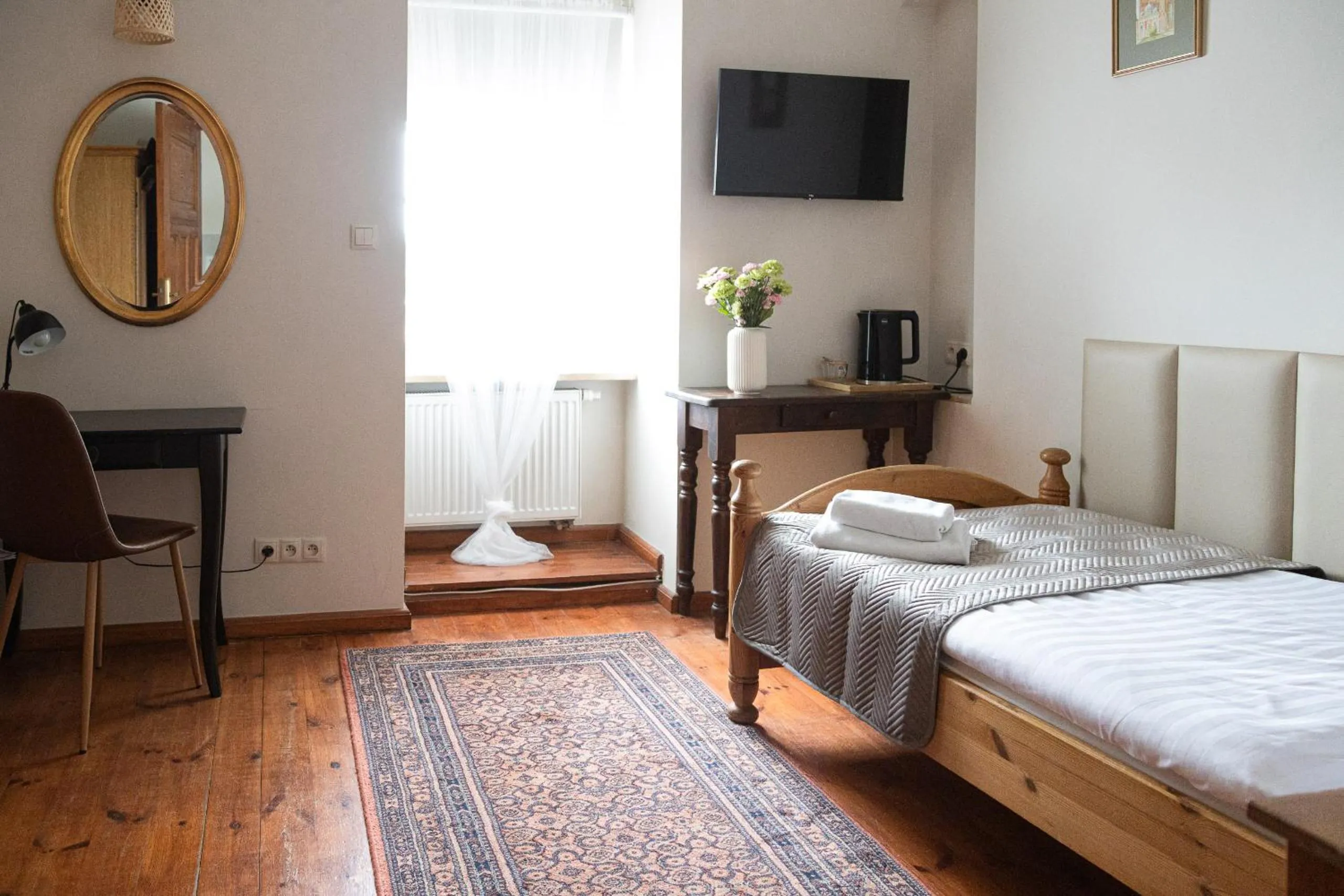 Bed in Mleczarnia Hotel Restauracja