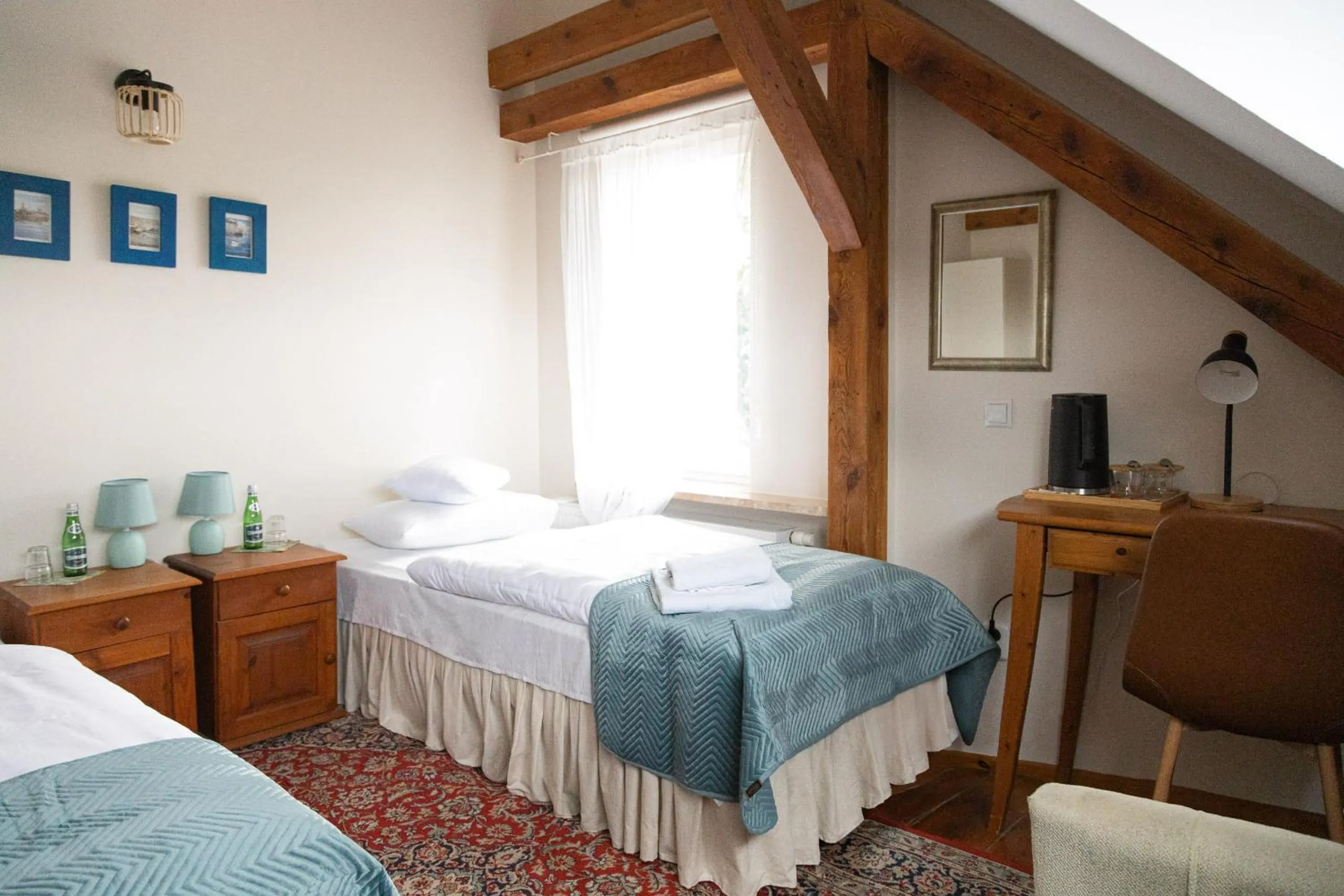 Bed in Mleczarnia Hotel Restauracja