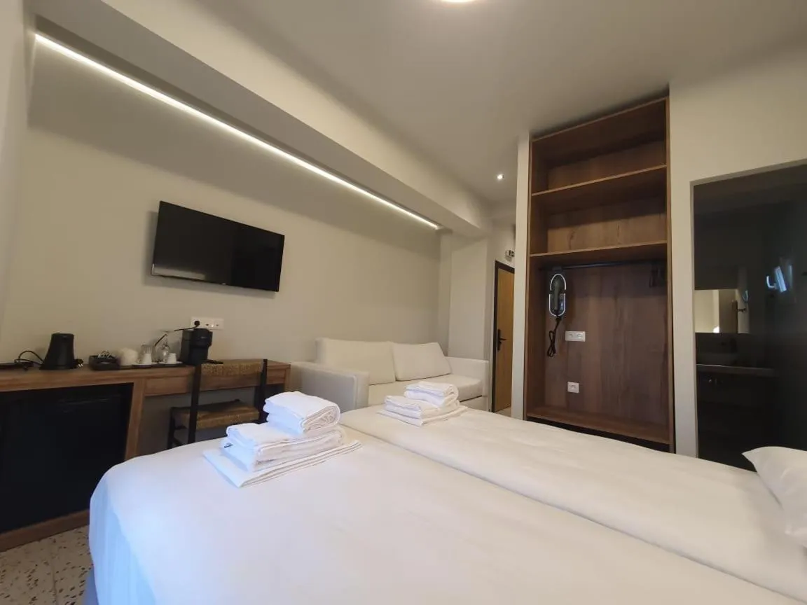 Bed in Uphill Unique Boutique Suites