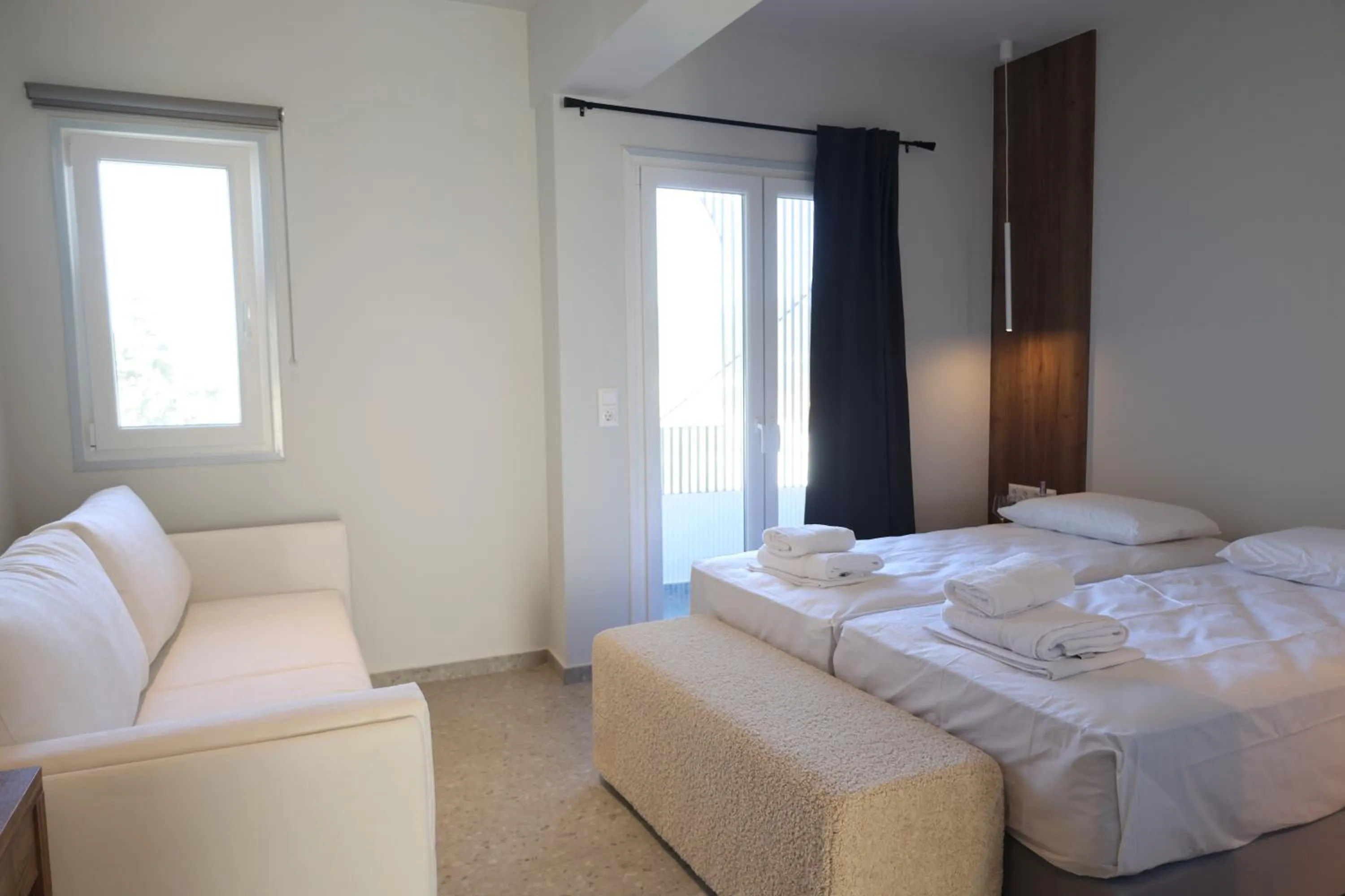 Bed in Uphill Unique Boutique Suites