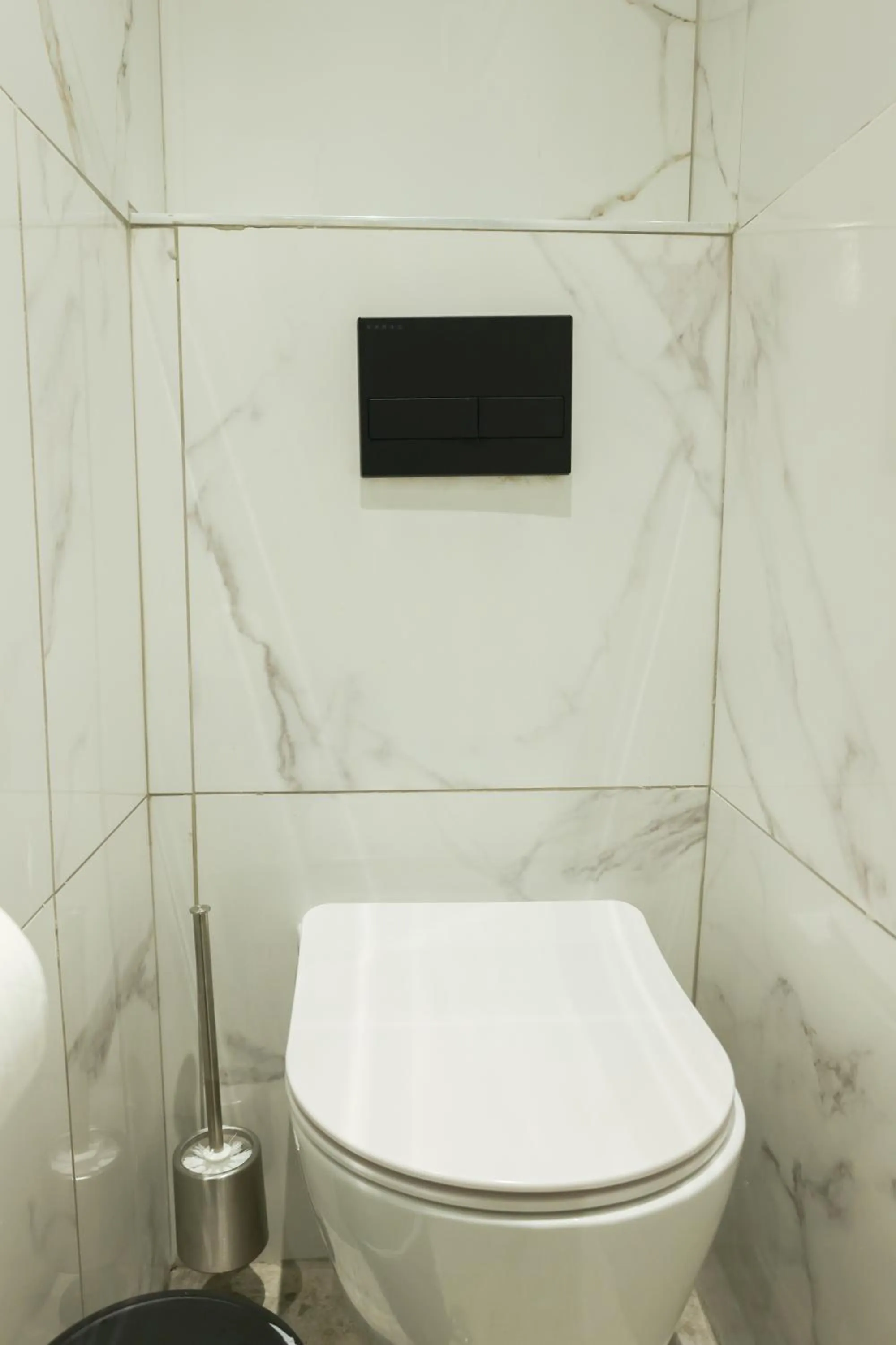 Toilet in Uphill Unique Boutique Suites