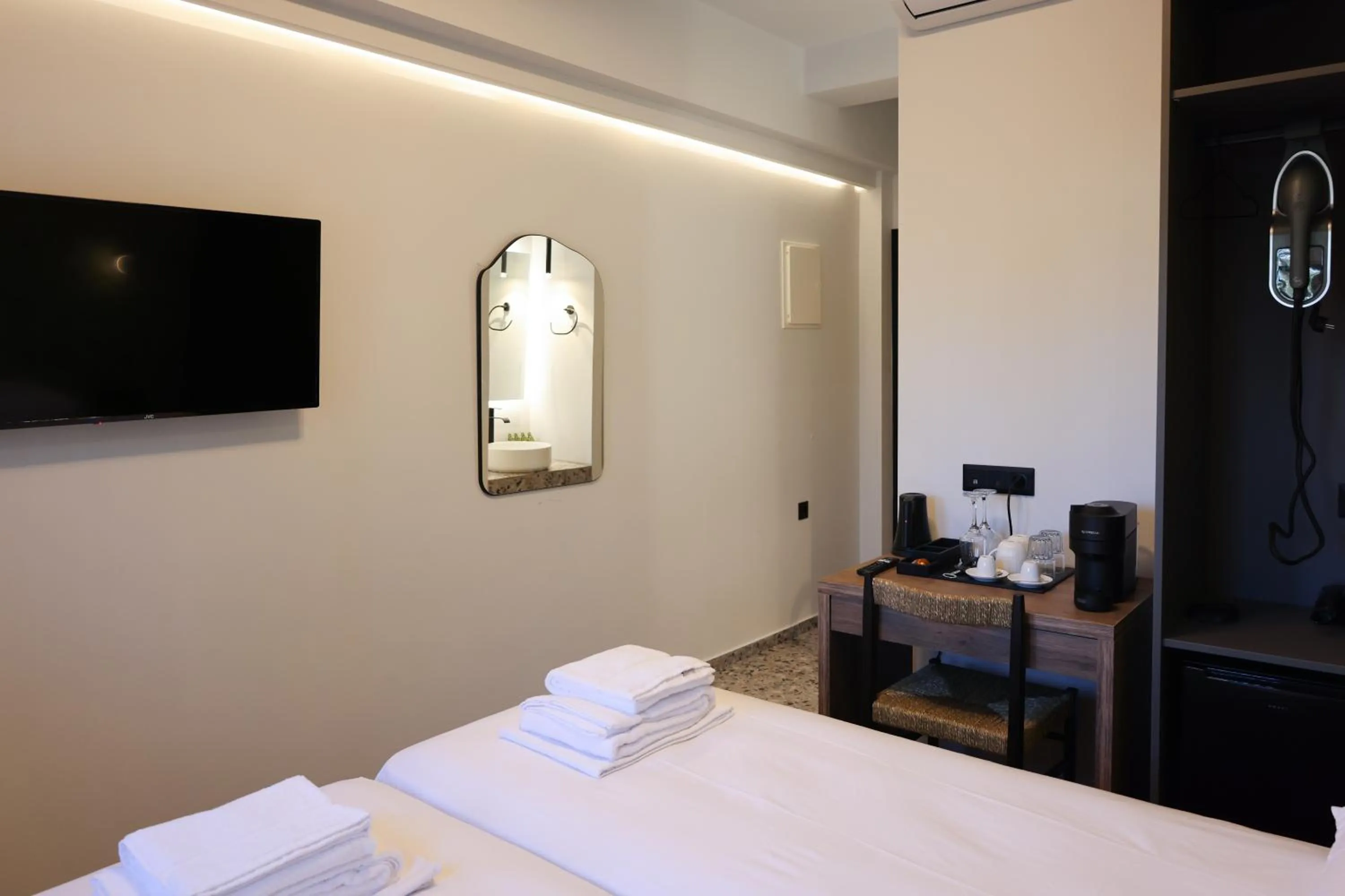 Photo of the whole room, Bed in Uphill Unique Boutique Suites