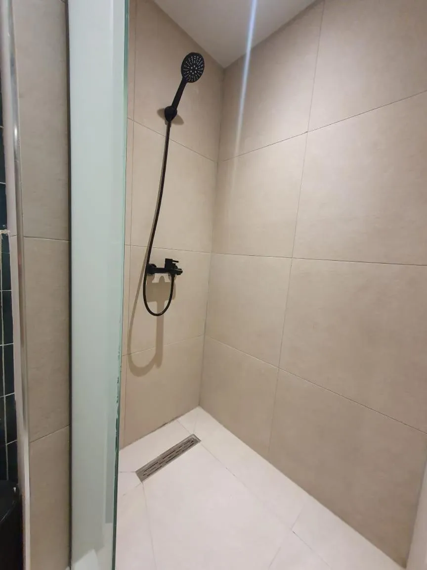 Shower in Uphill Unique Boutique Suites