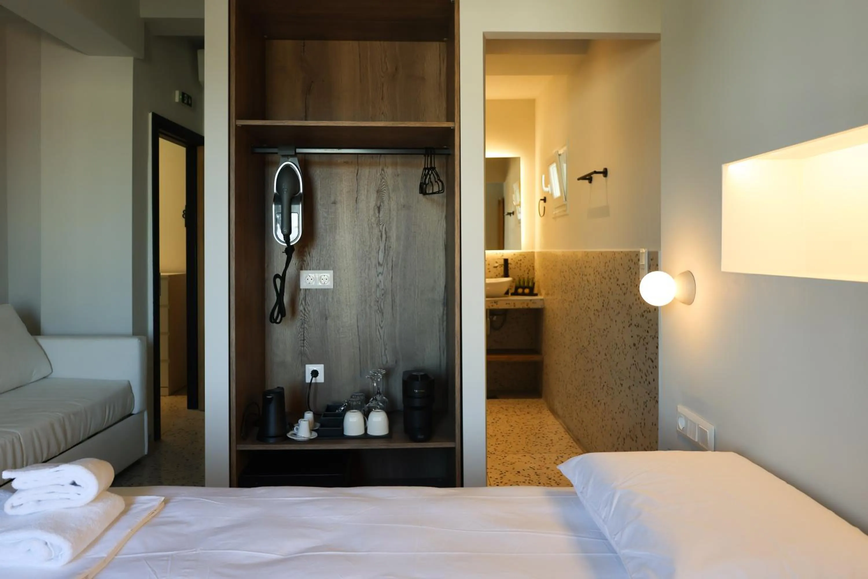 Shower, Bed in Uphill Unique Boutique Suites