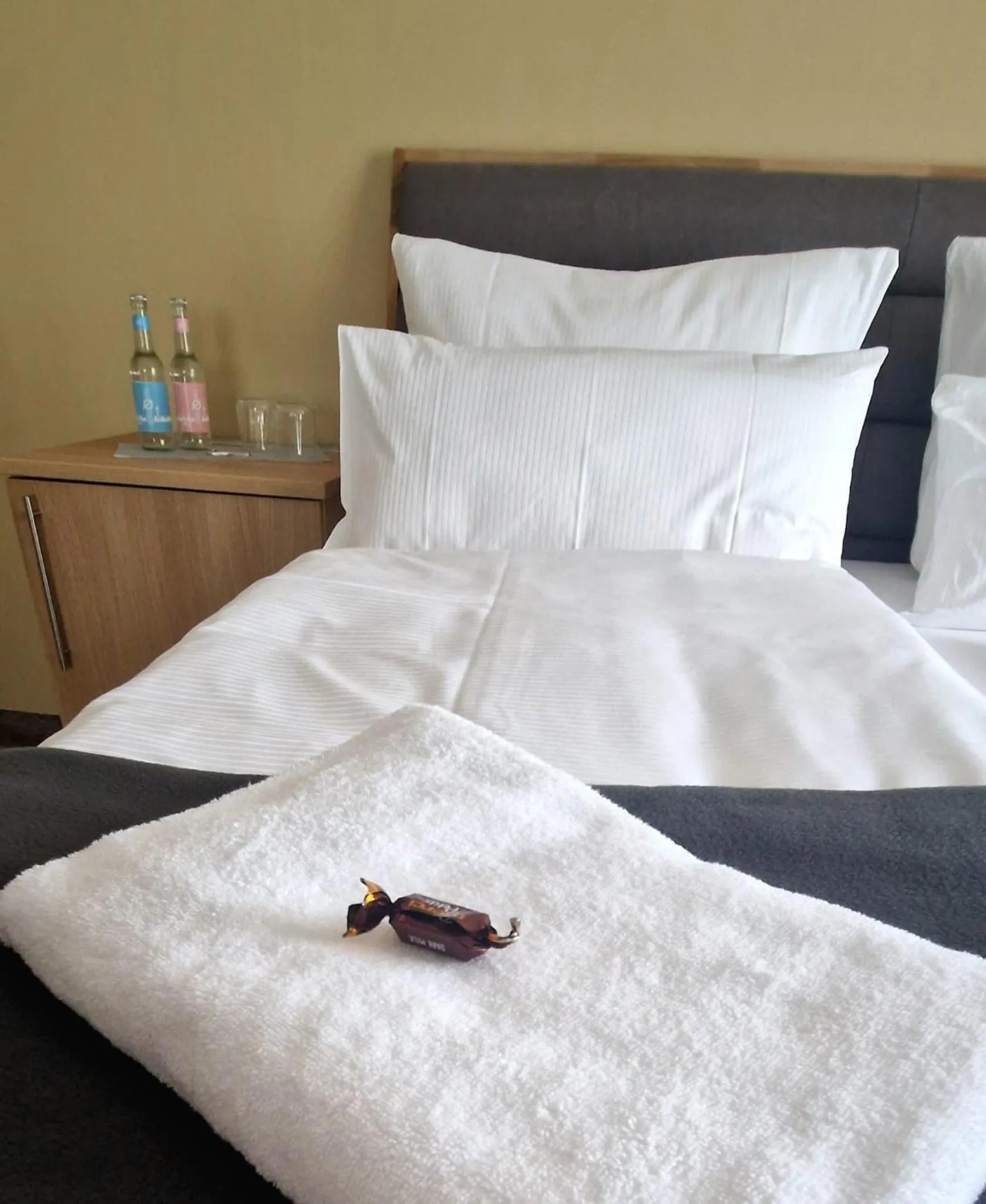 Bed in Hotel Rhin Inn