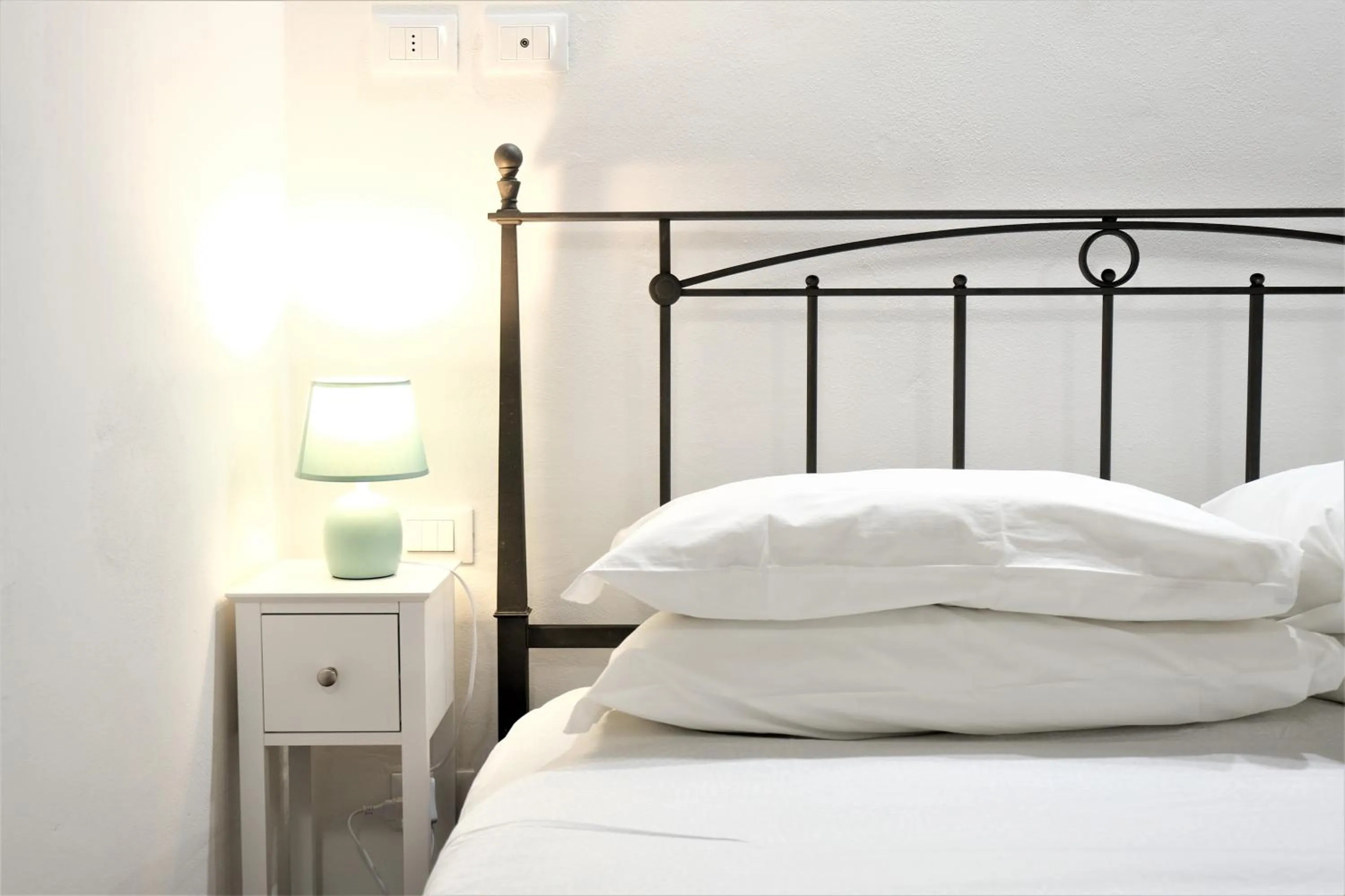 Bed in Wine Apartments Florence Ribolla