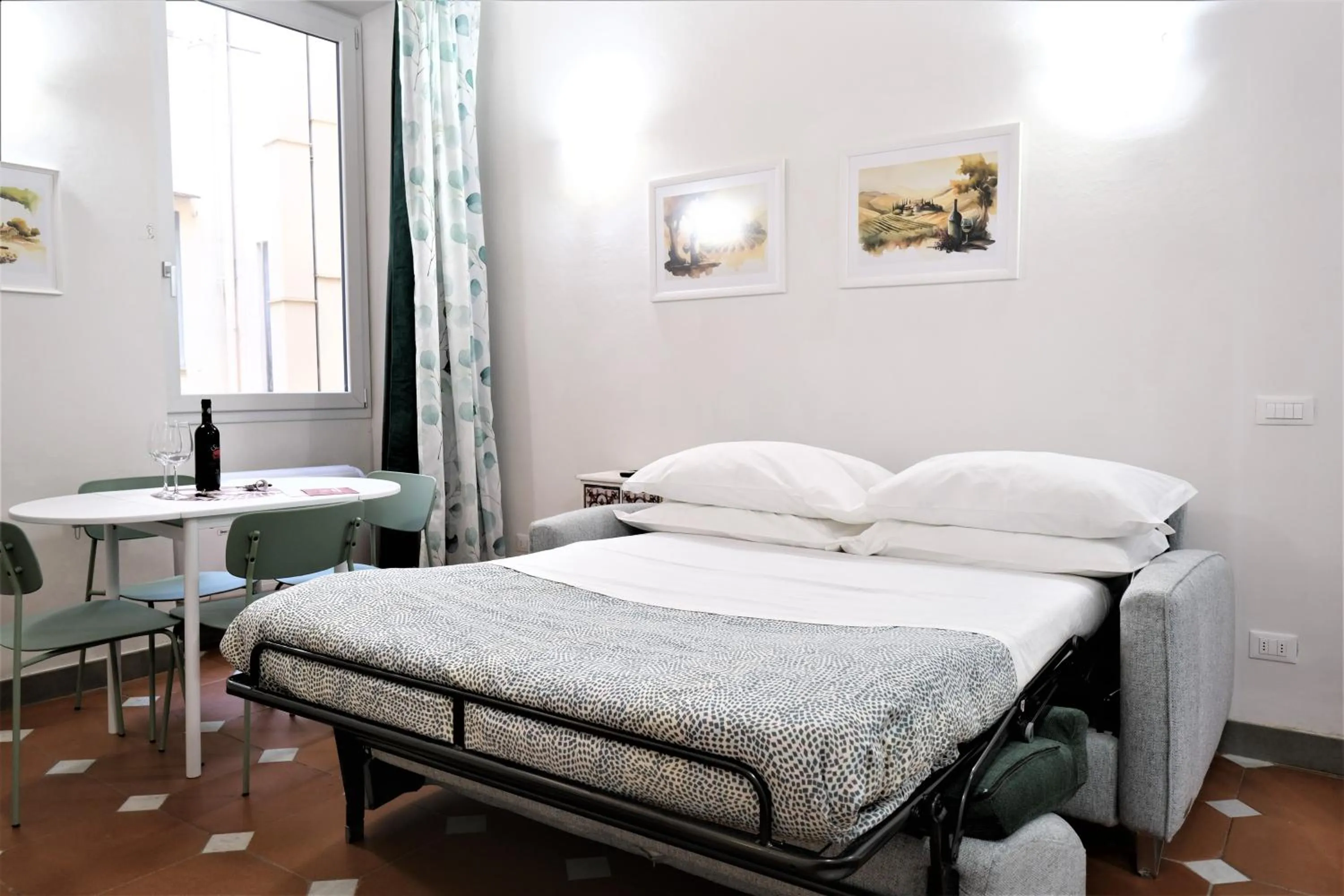 Bed in Wine Apartments Florence Ribolla
