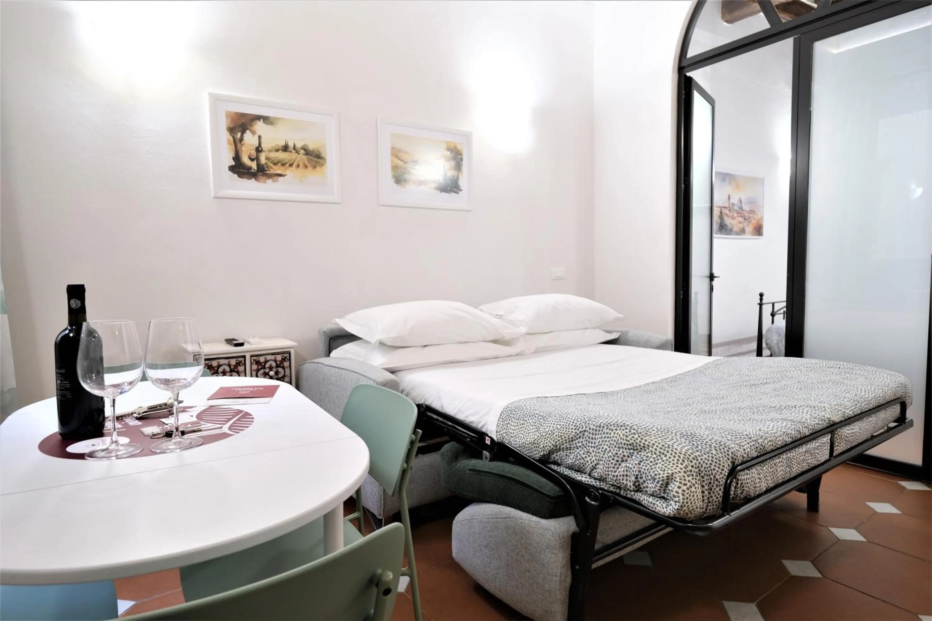 Living room, Bed in Wine Apartments Florence Ribolla