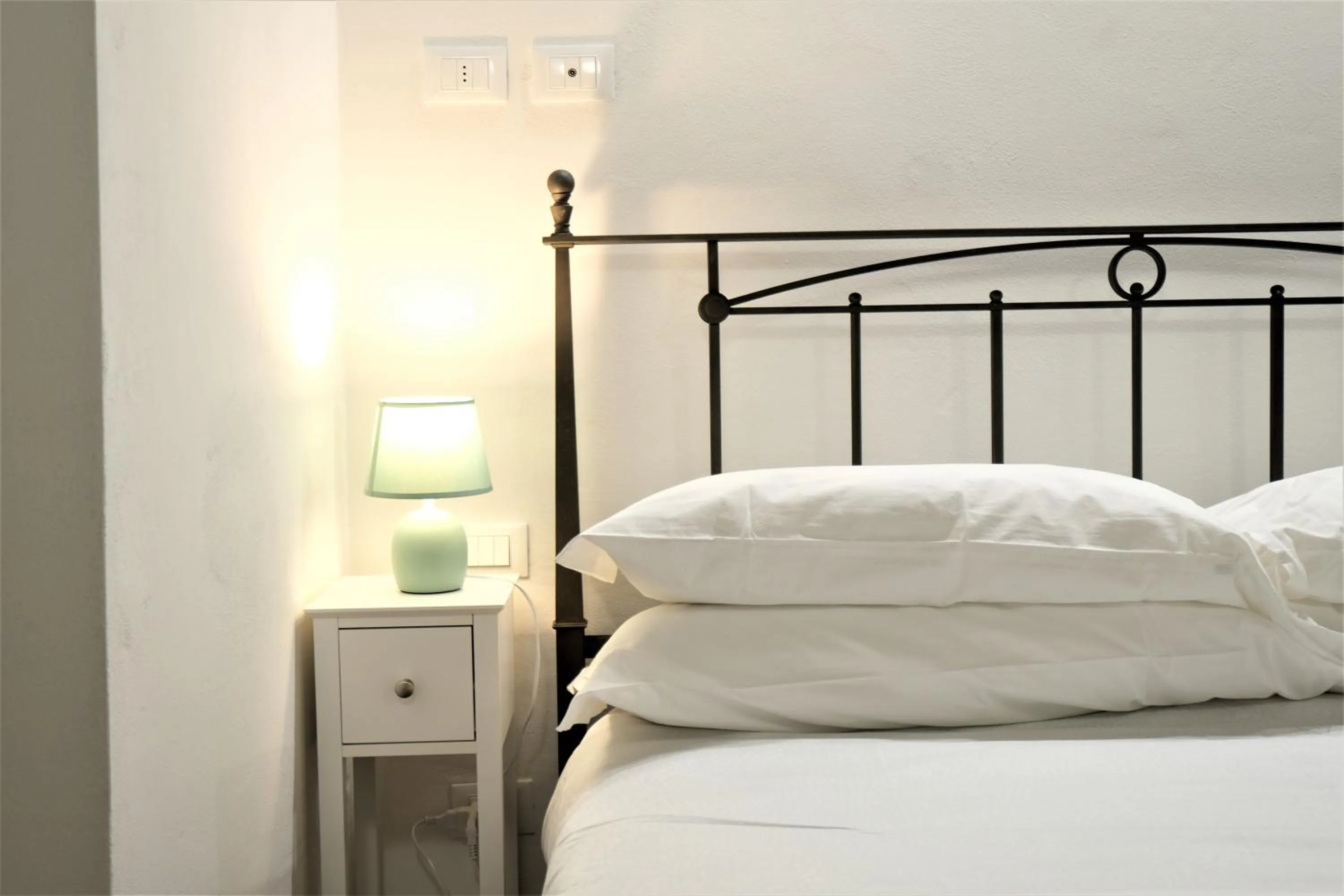 Bed in Wine Apartments Florence Ribolla