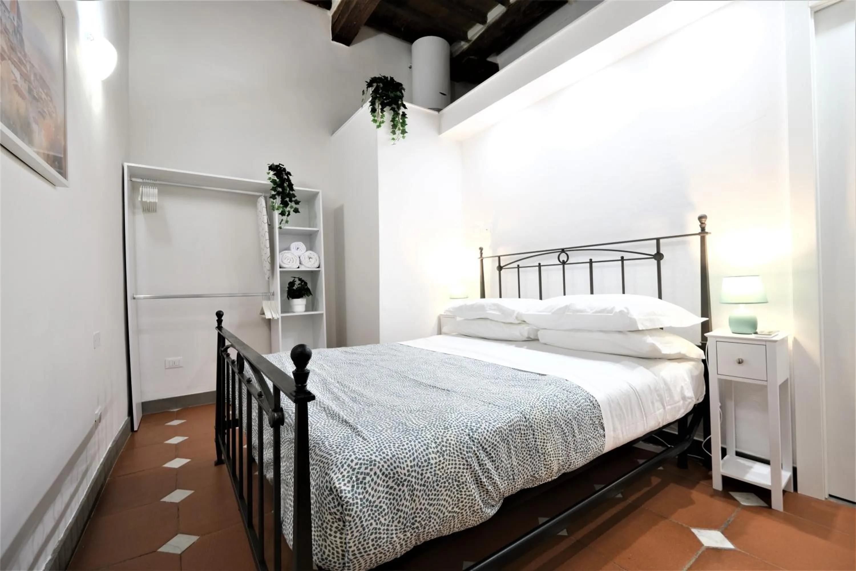 Bed in Wine Apartments Florence Ribolla