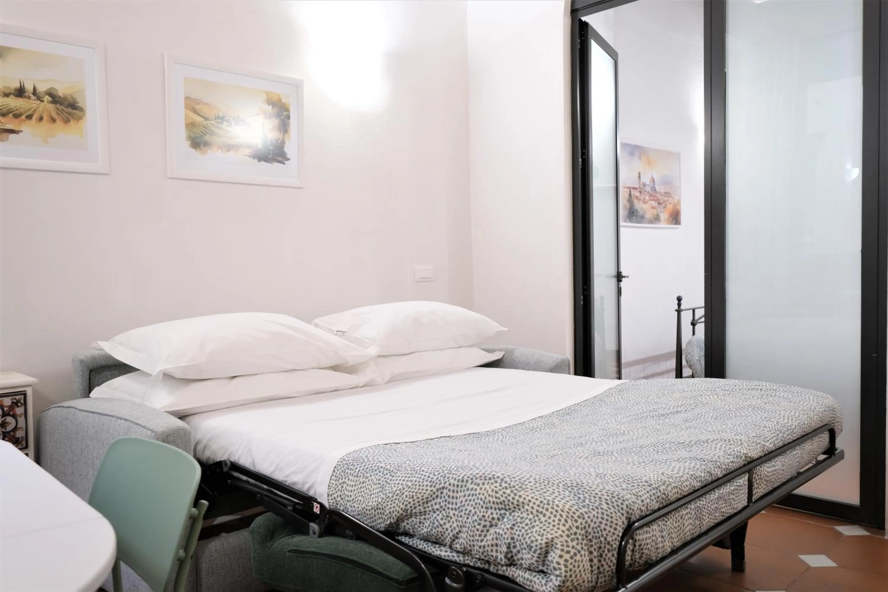 Bed in Wine Apartments Florence Ribolla