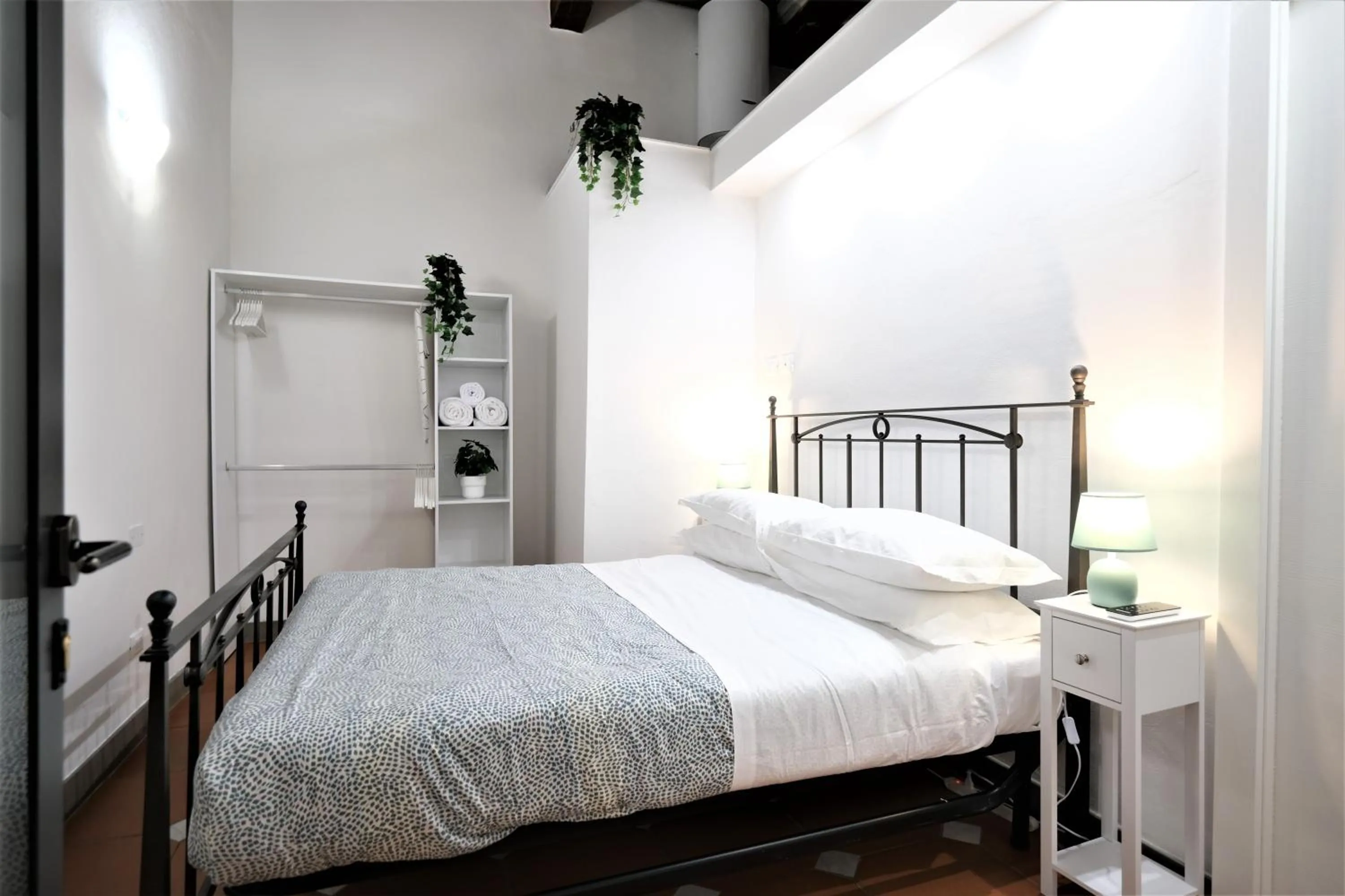 Bed in Wine Apartments Florence Ribolla