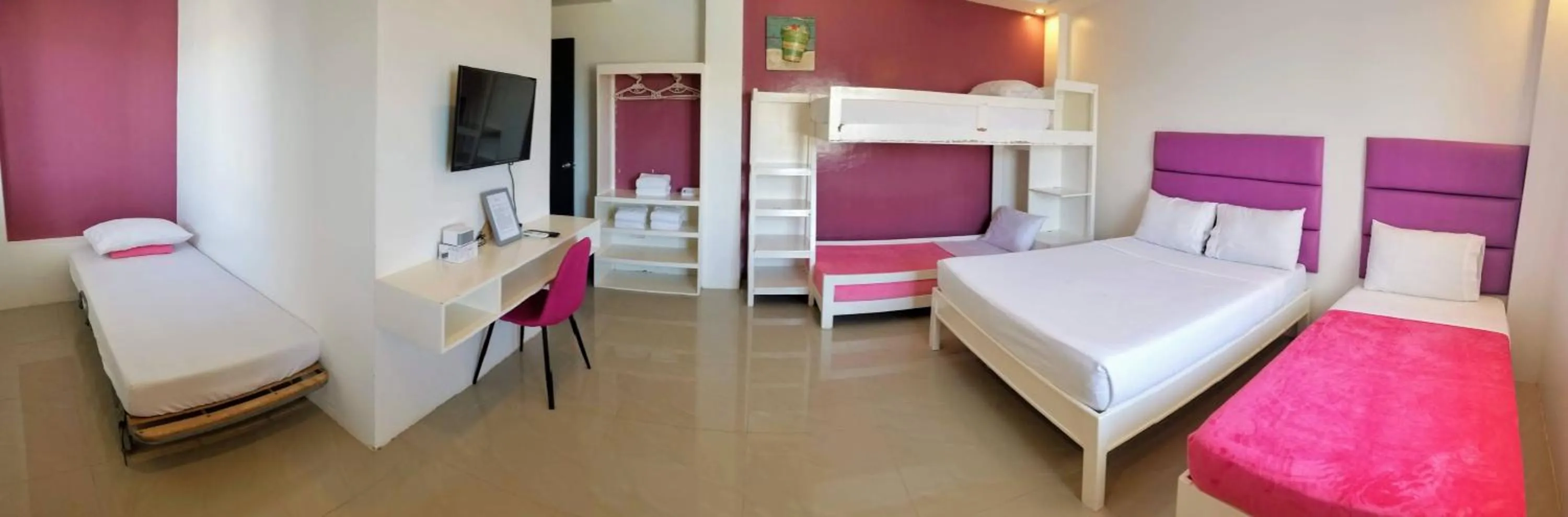 Bed in Blue Coast Beach Hotel