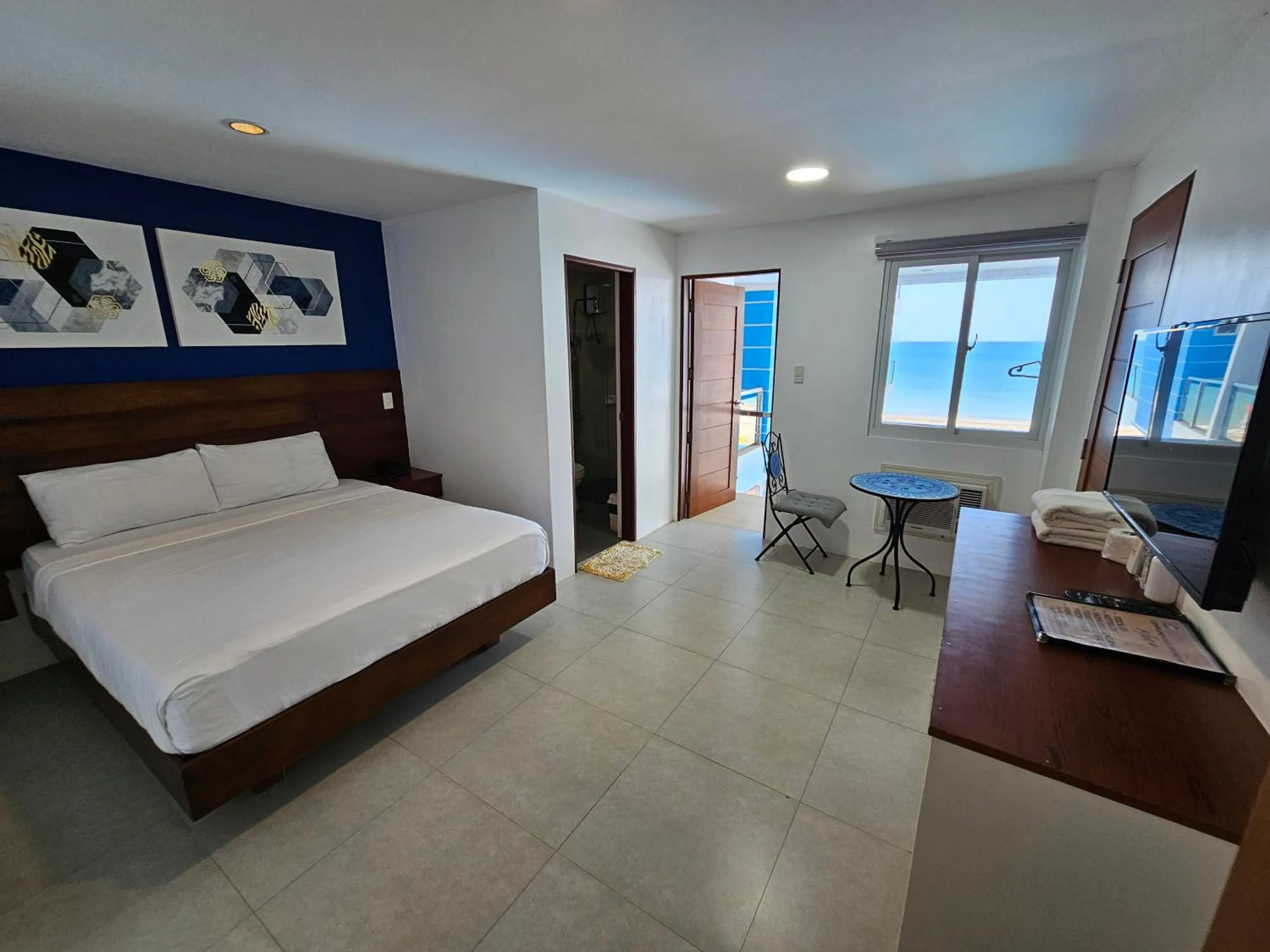 Bedroom, Bed in Blue Coast Beach Hotel