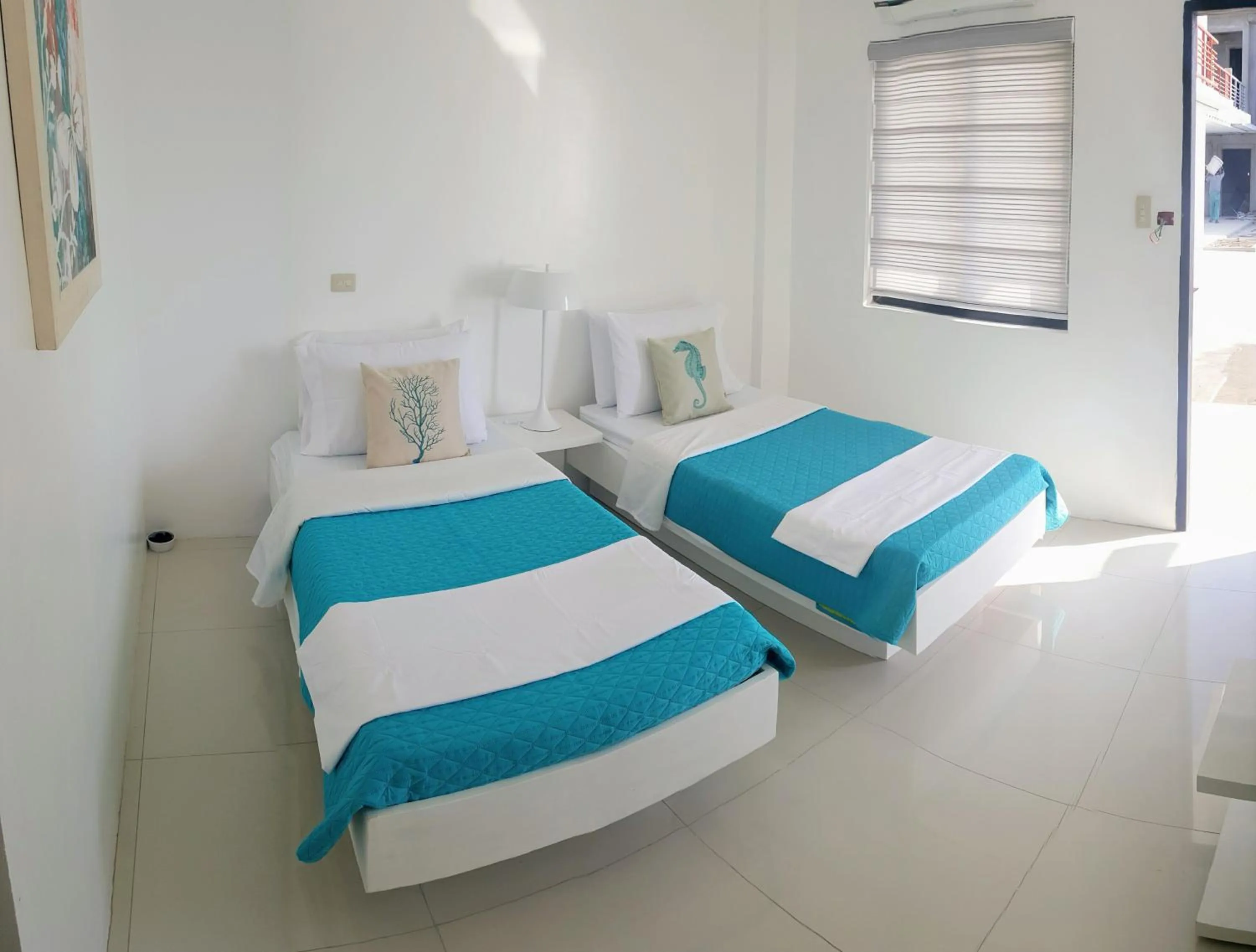 Coffee/tea facilities, Bed in Blue Coast Beach Hotel