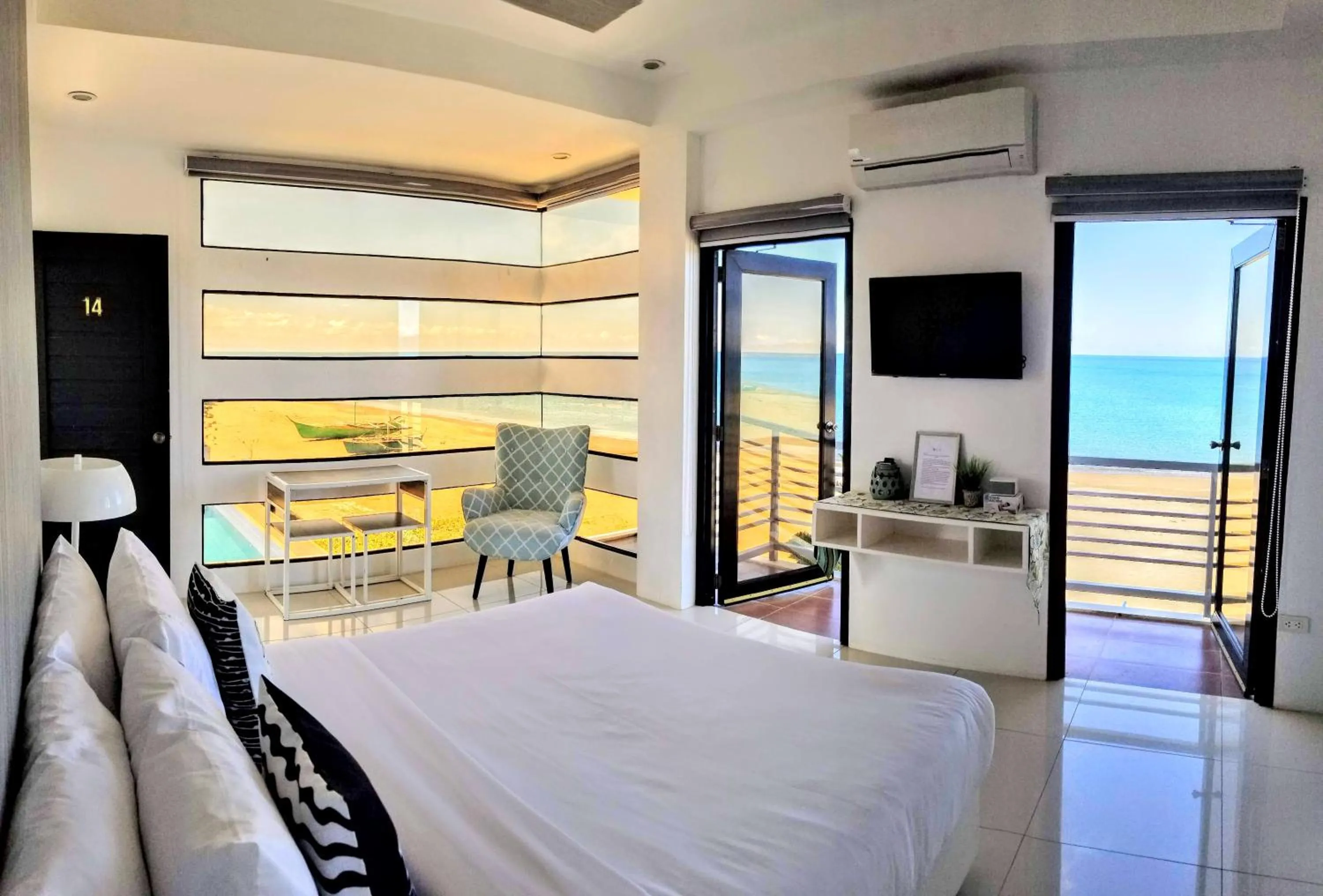 Balcony/Terrace, Bed in Blue Coast Beach Hotel