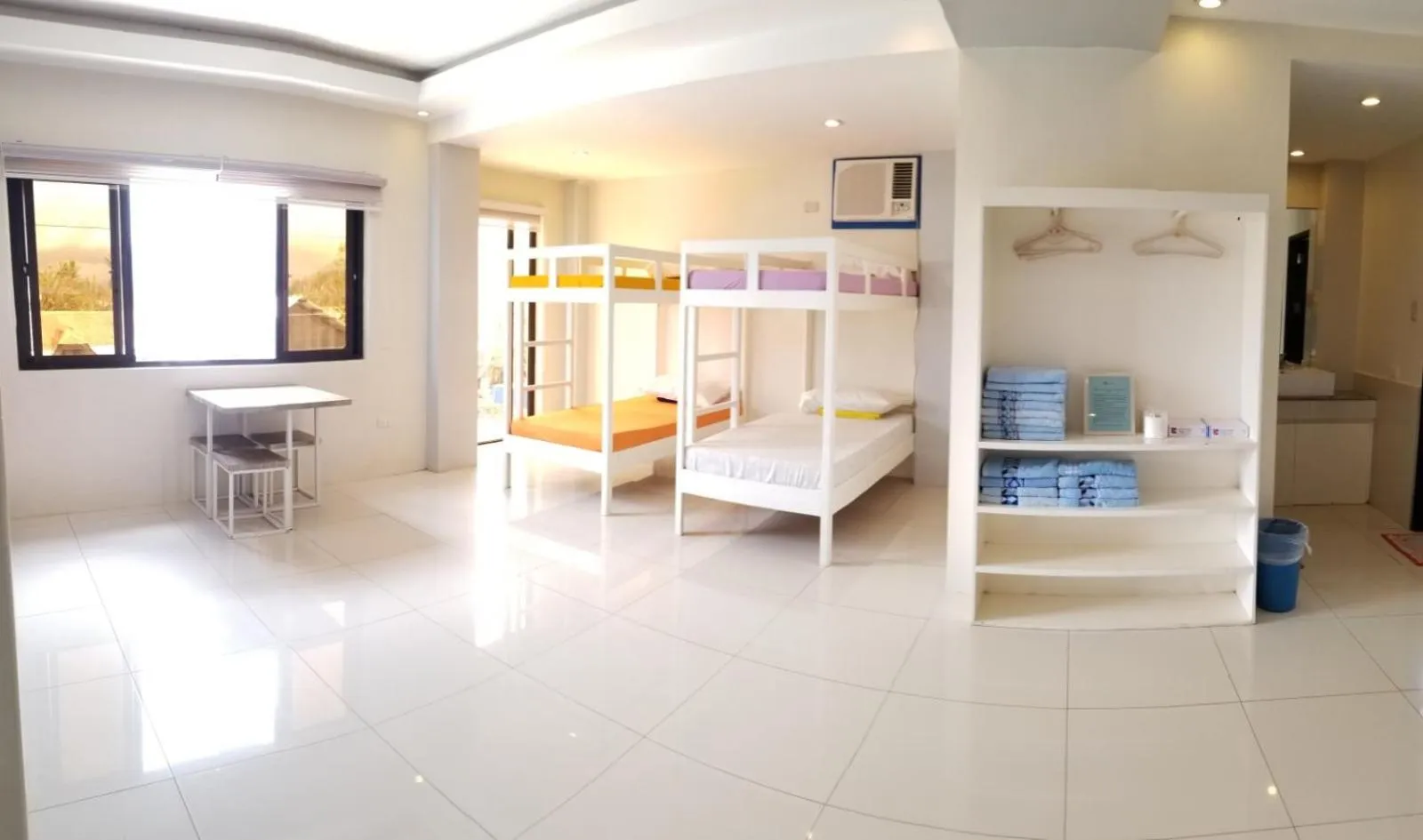 Bed in Blue Coast Beach Hotel