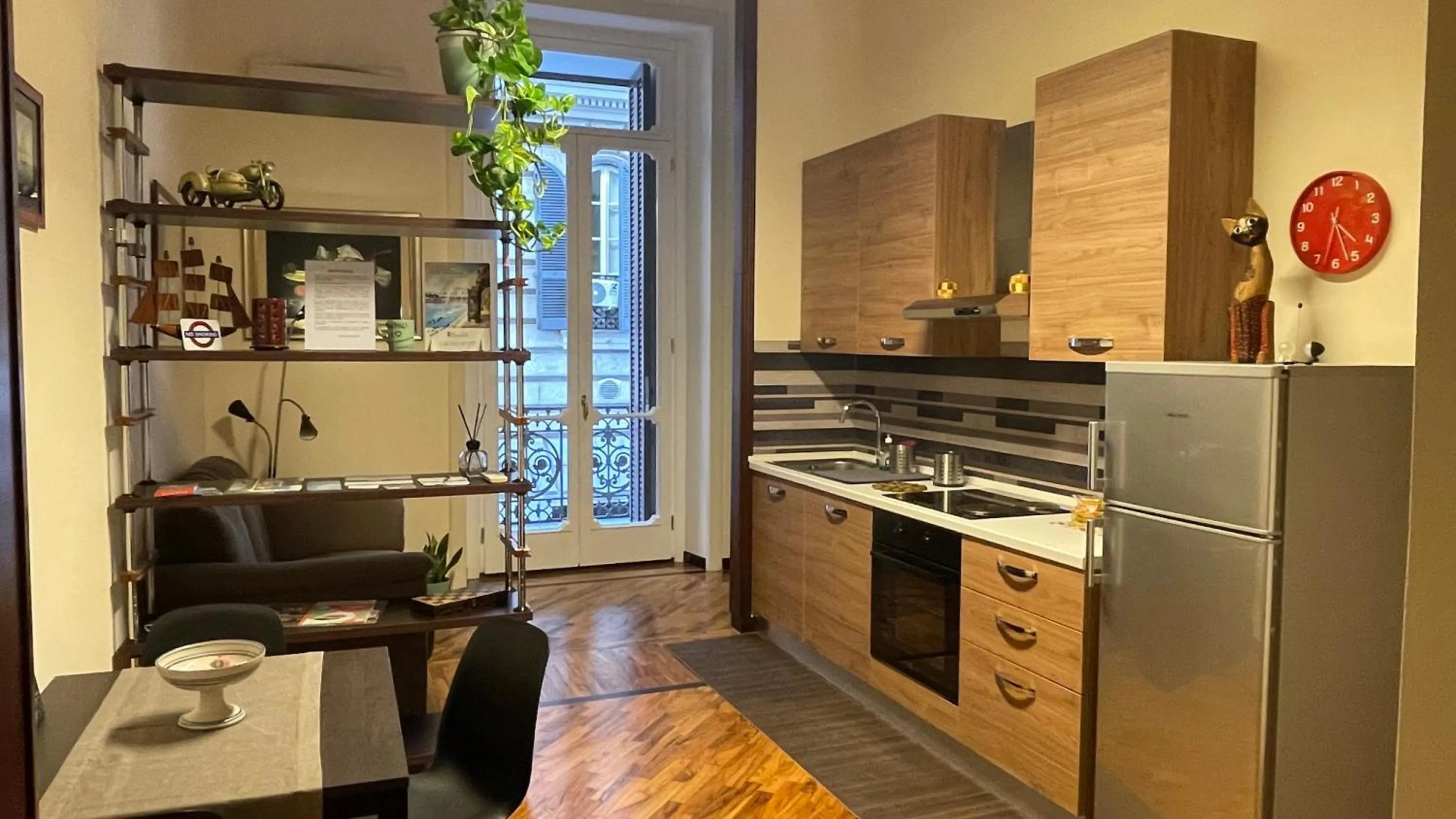 Kitchen or kitchenette in Caravaggio Apartment