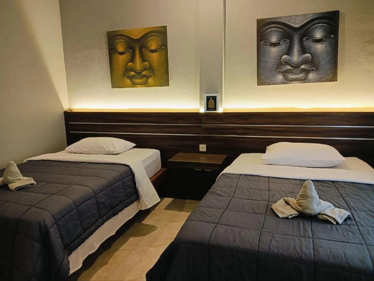Bed in Nobody Inn Bali at Arya guest house