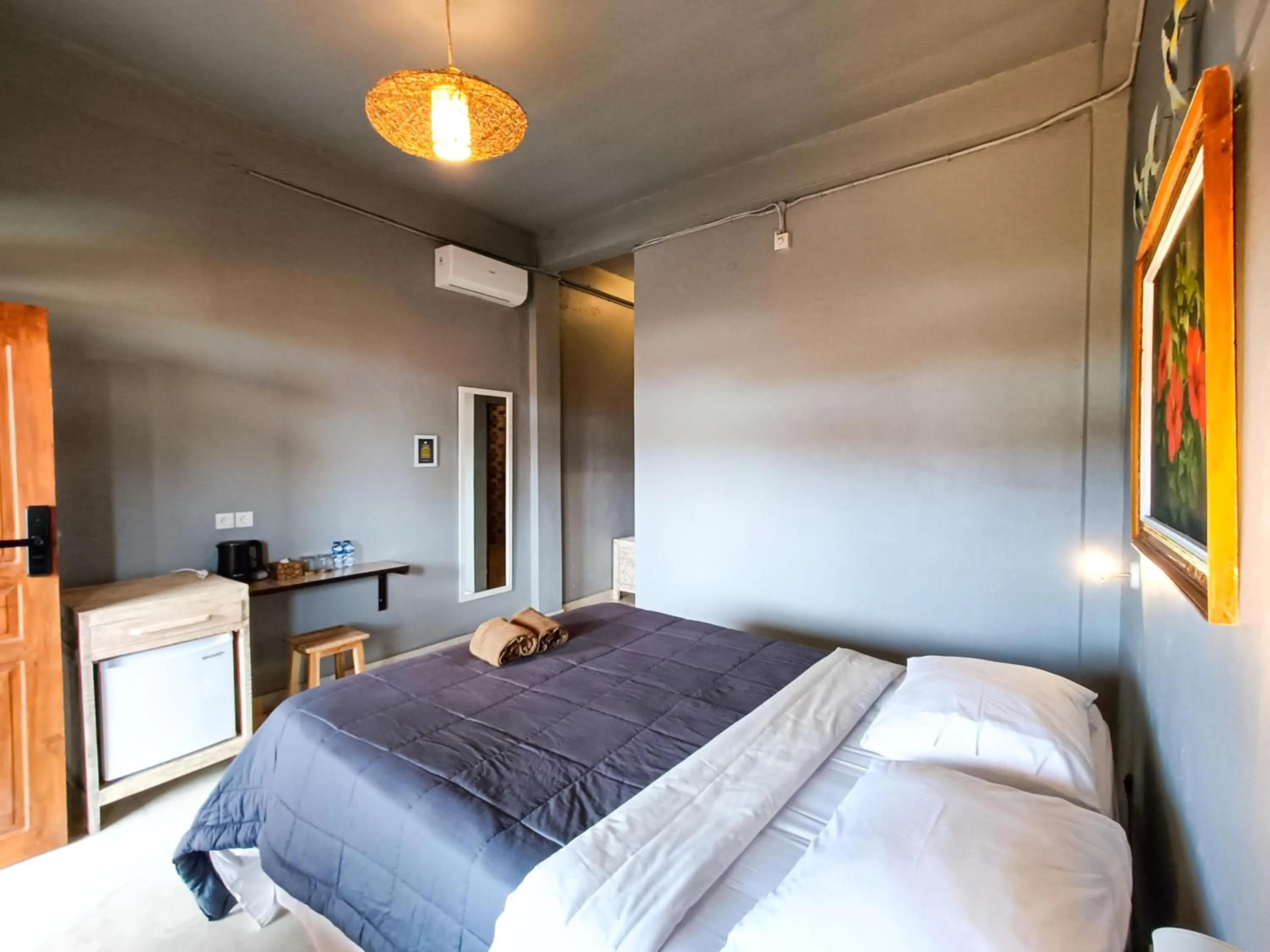 Bed in Nobody Inn Bali at Arya guest house