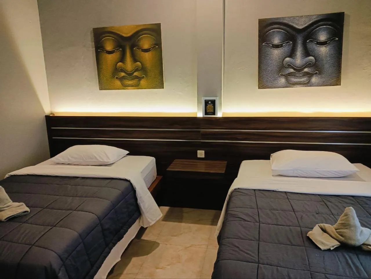 Bed in Nobody Inn Bali at Arya guest house