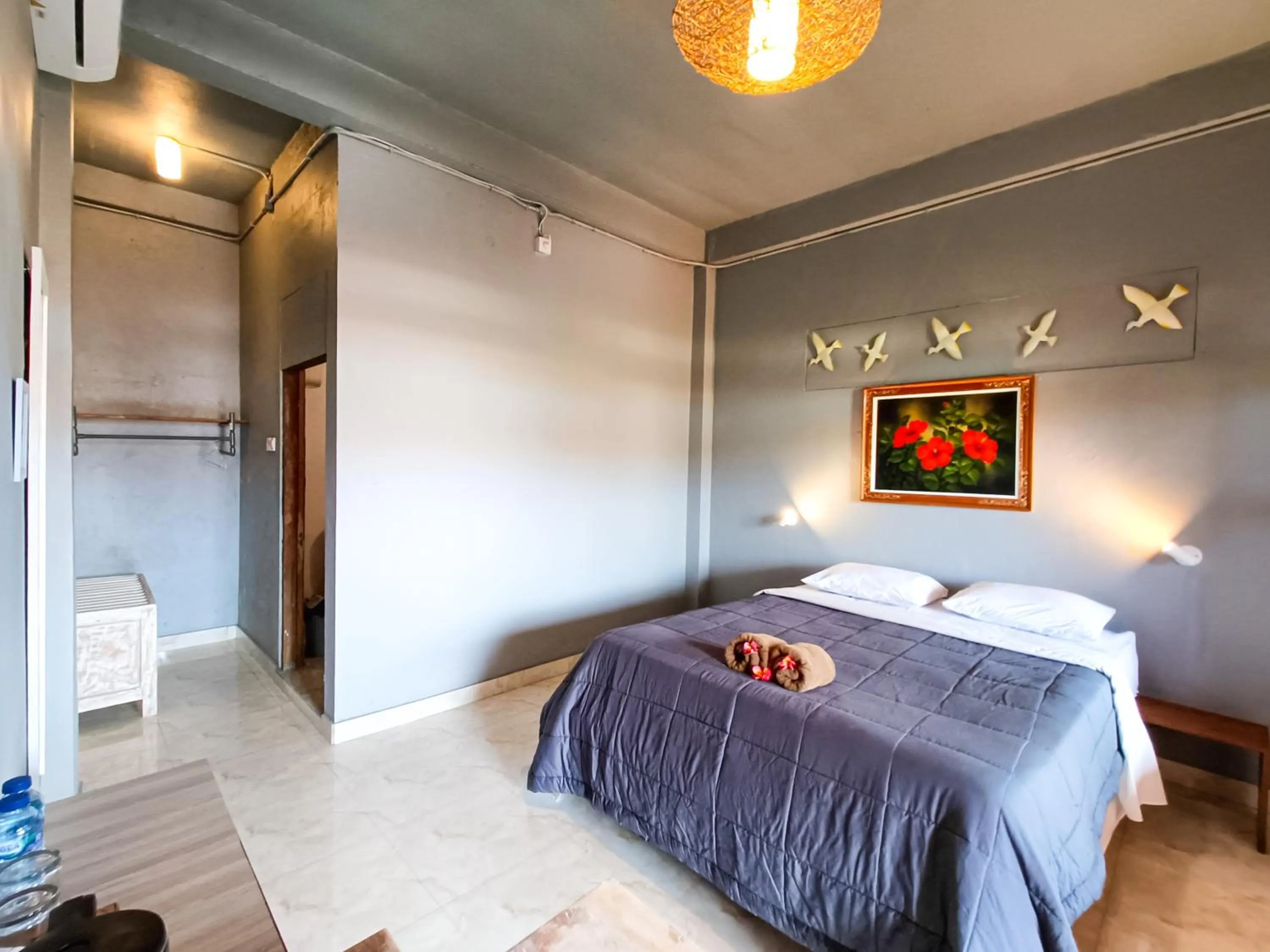 Bed in Nobody Inn Bali at Arya guest house