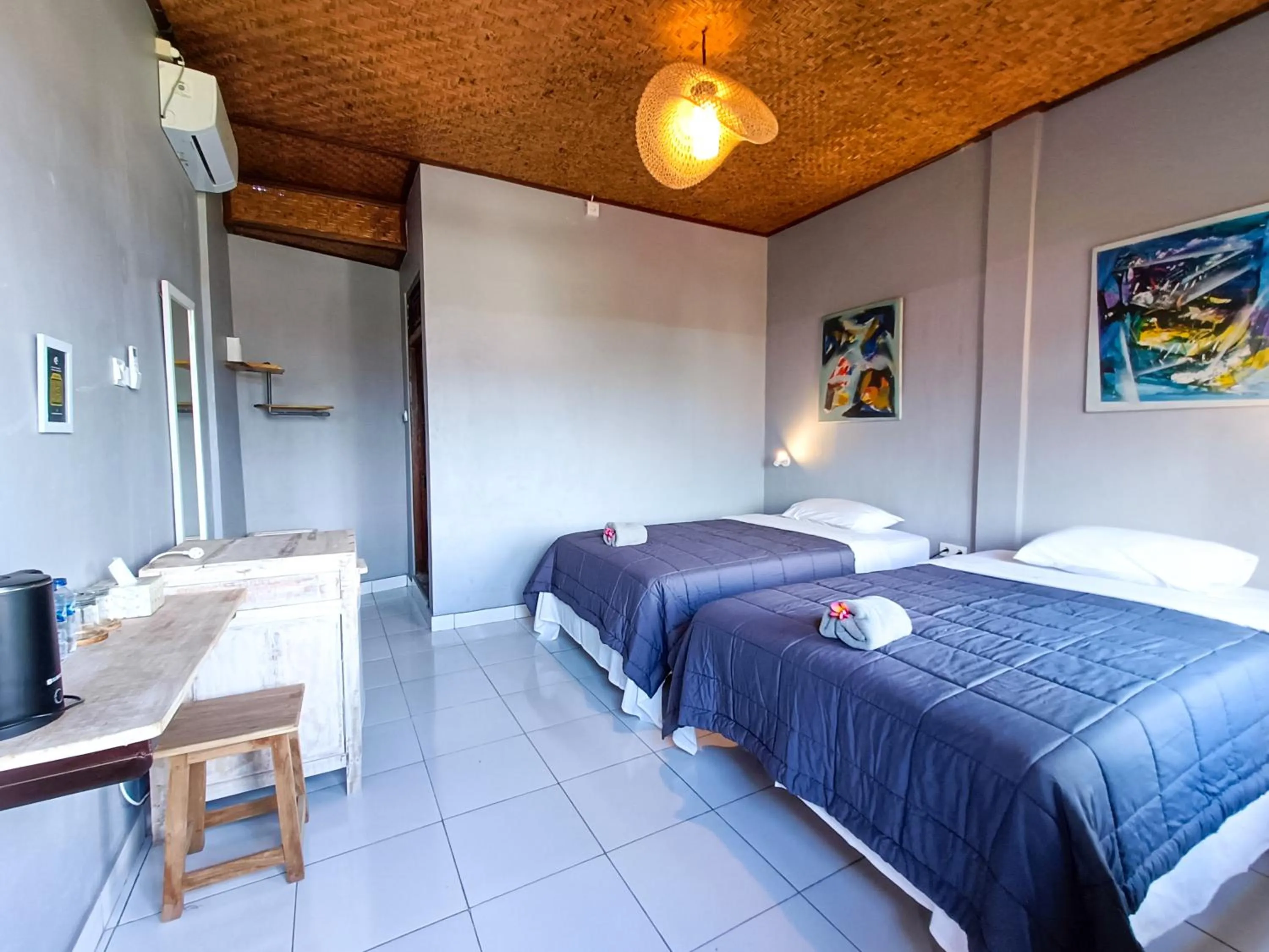 Bed in Nobody Inn Bali at Arya guest house