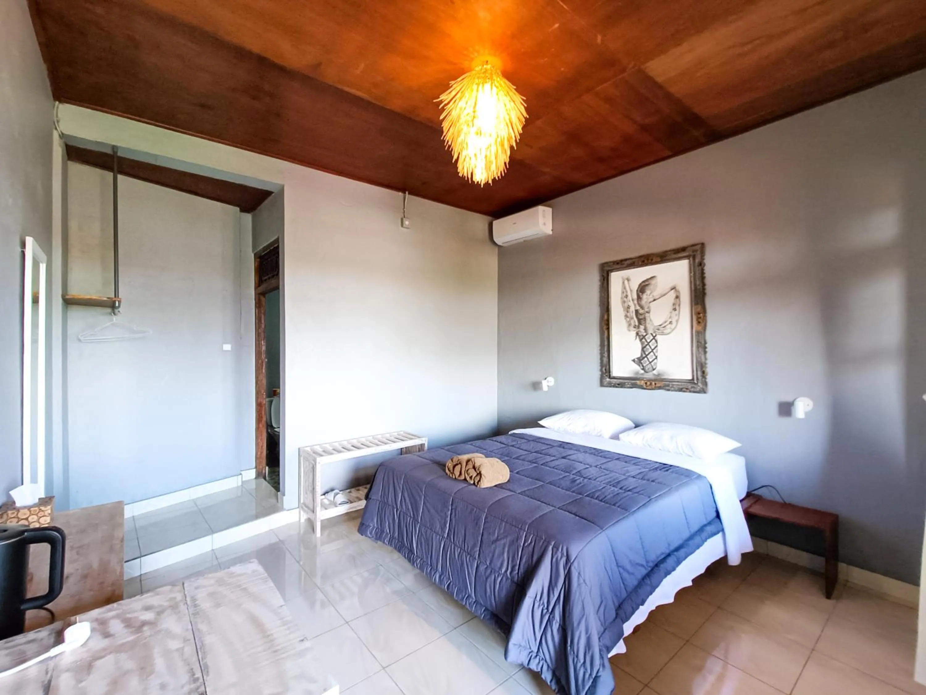 Bed in Nobody Inn Bali at Arya guest house