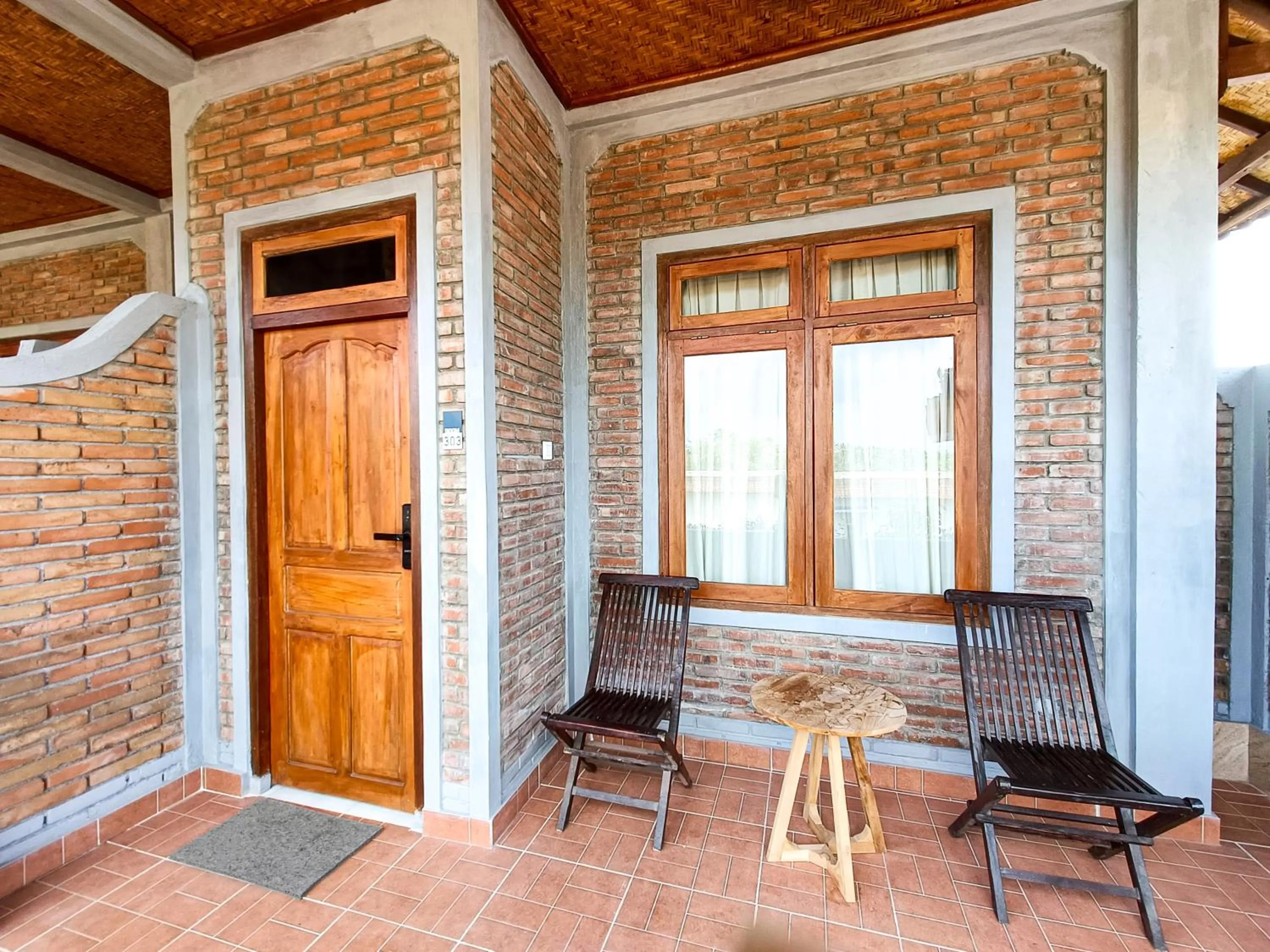 Patio in Nobody Inn Bali at Arya guest house