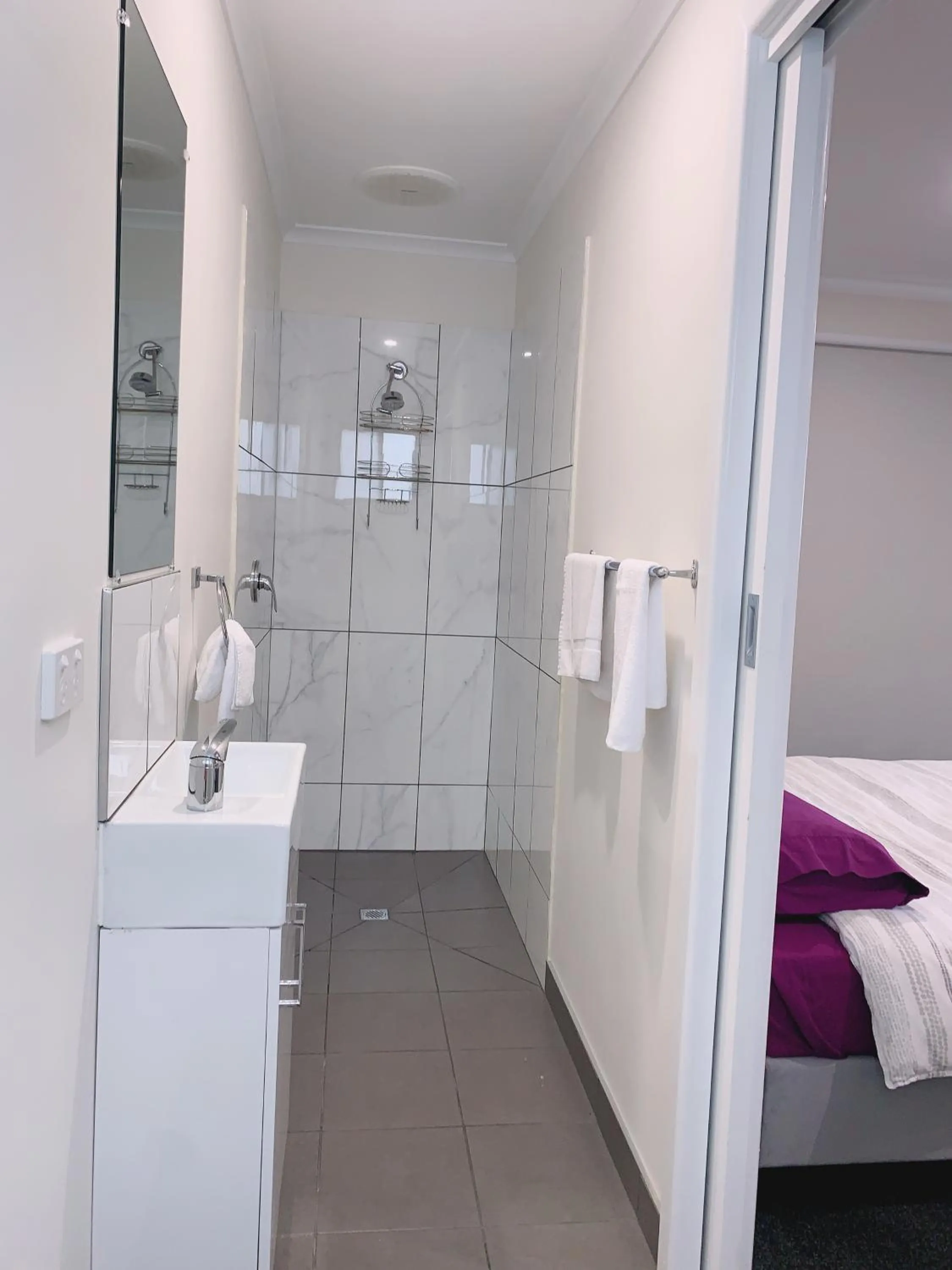 Bathroom, Bed in Colac Otway Caravan & Cabin Park