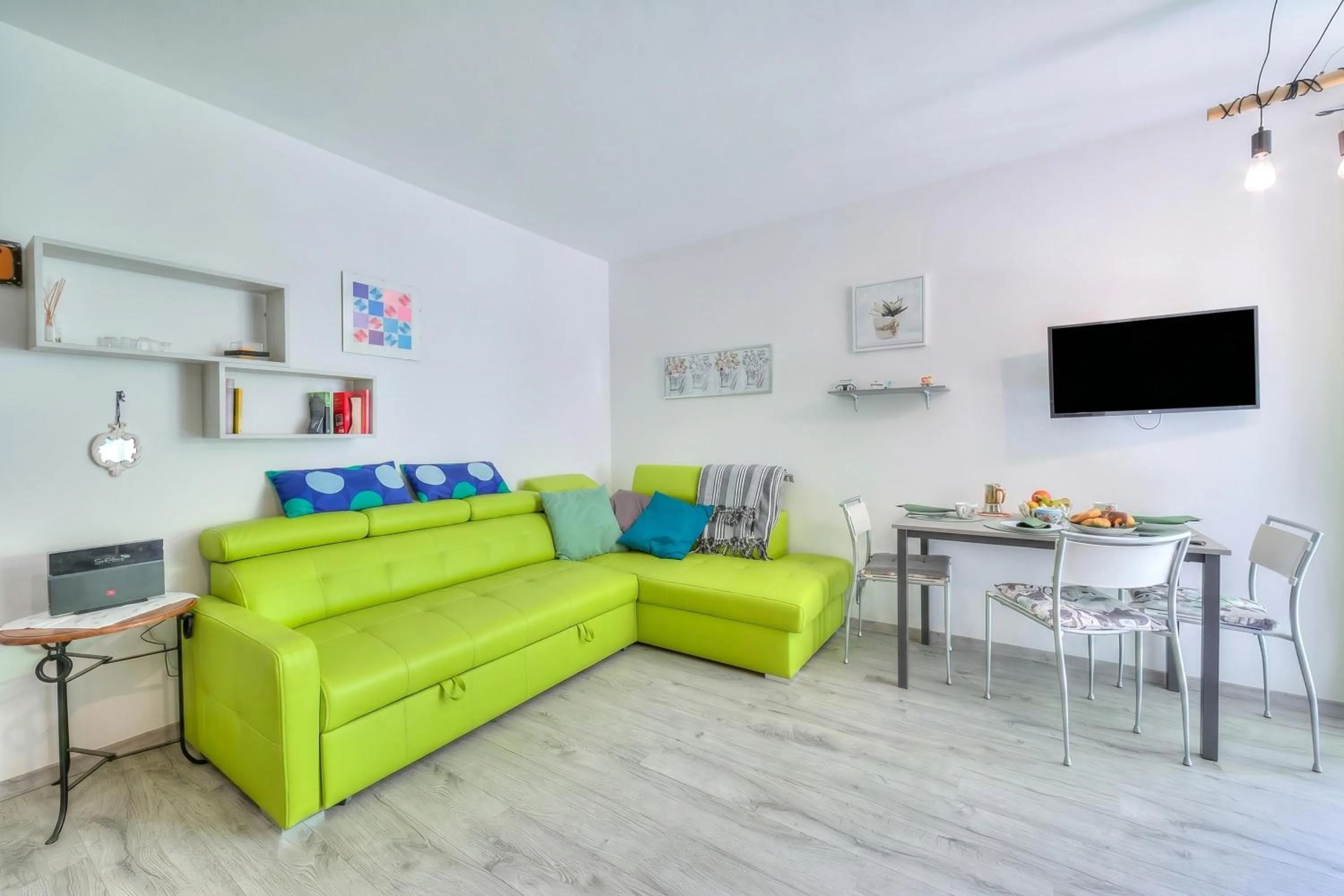 Living room in Marina's Green Home - Happy Rentals