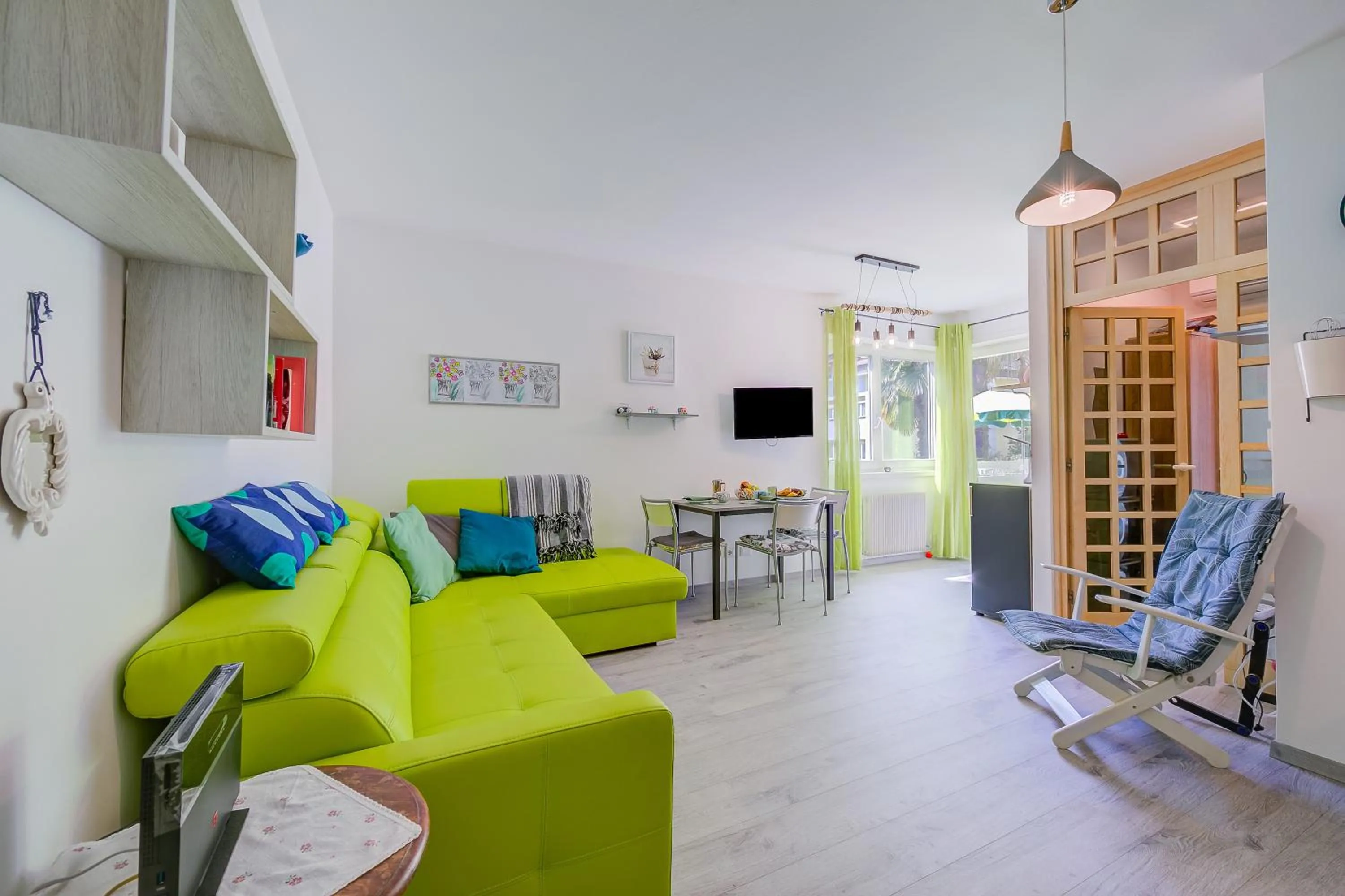 Living room in Marina's Green Home - Happy Rentals