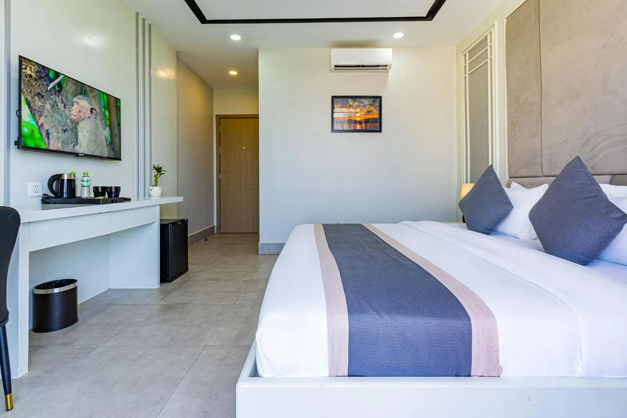 Bed in The Square Kampot Hotel