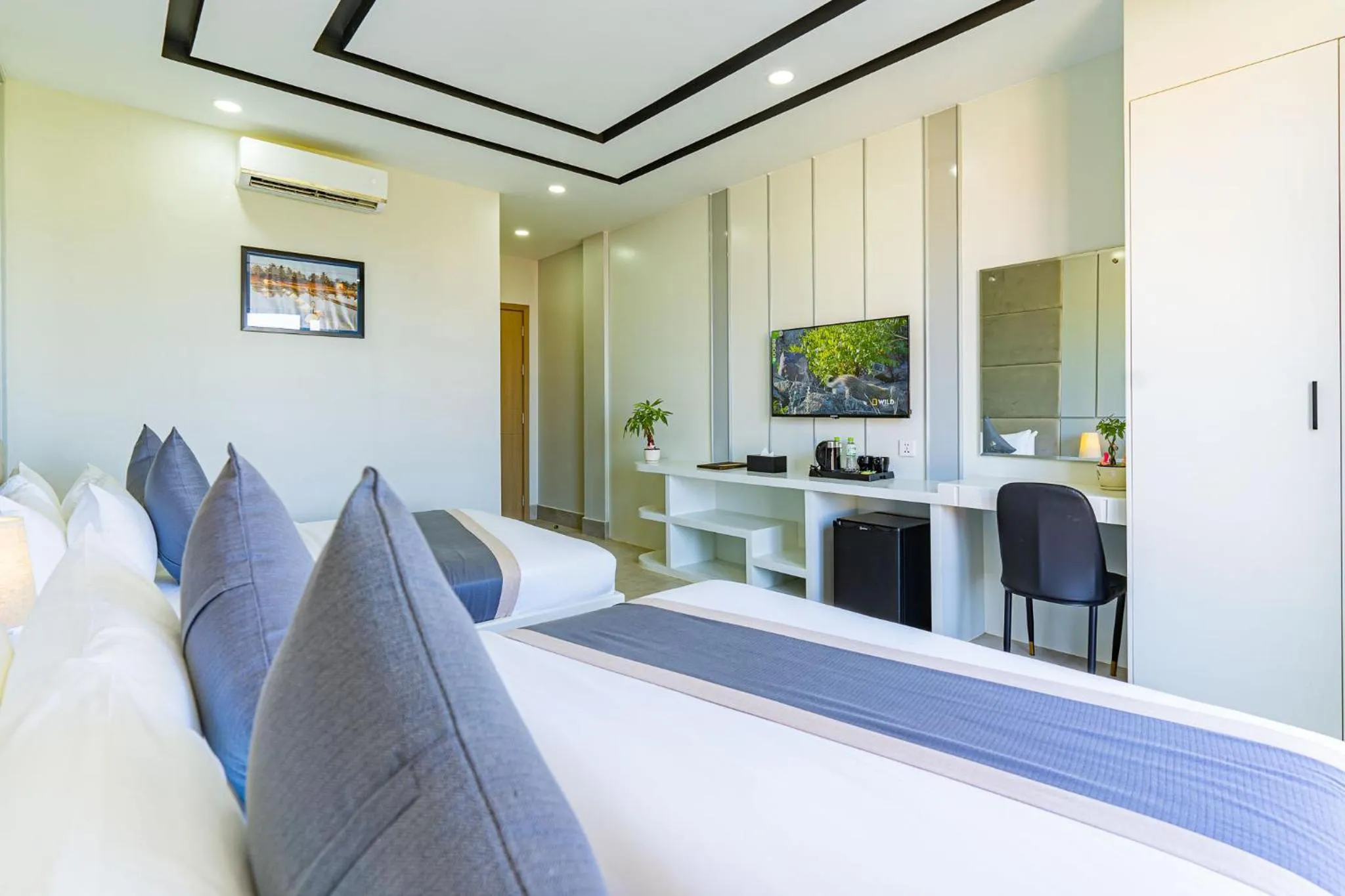 Bed in The Square Kampot Hotel